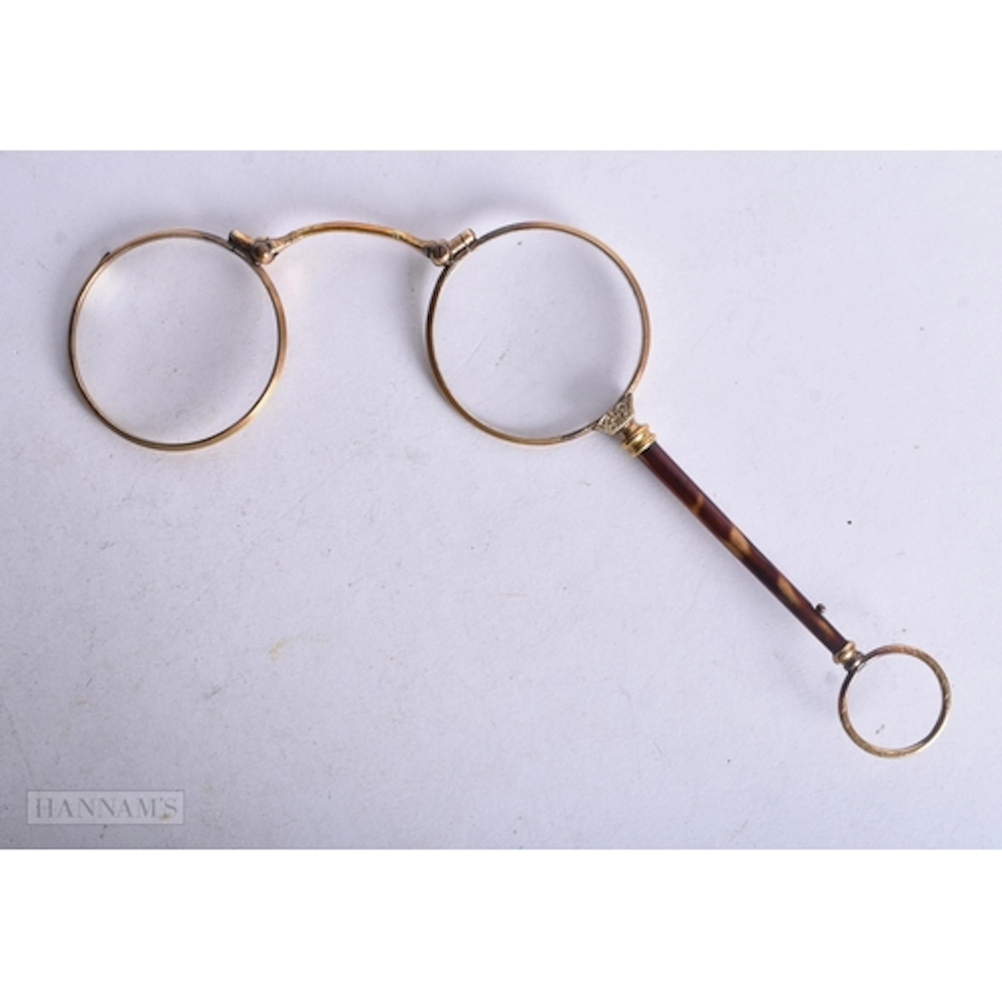 A PAIR OF TORTOISESHELL LORGNETTE. 12 cm x 10 cm.