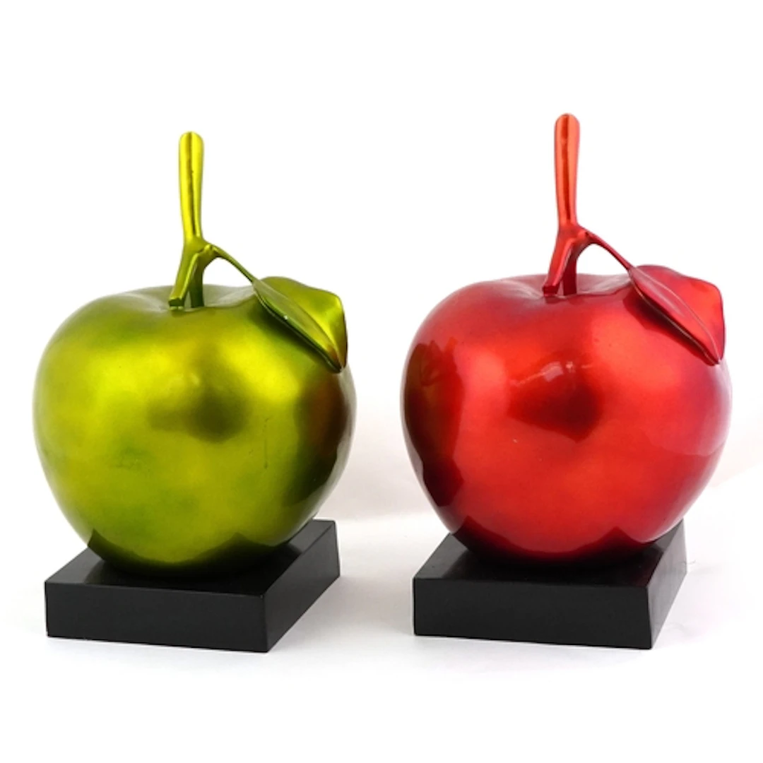 Pair of Modernist sculptures of a green and red apple, each ...