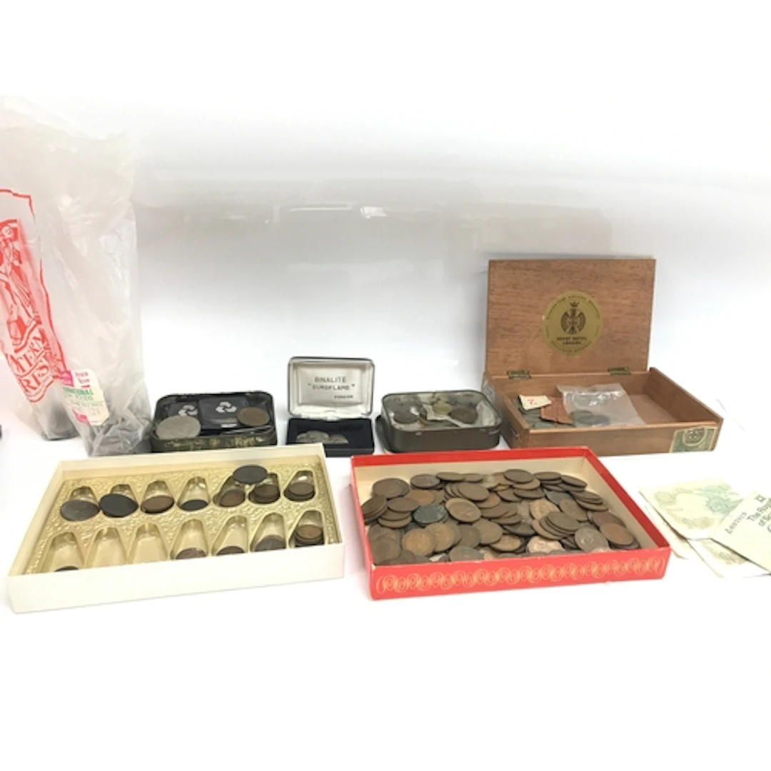 A collection of world coinage and small amount of notes