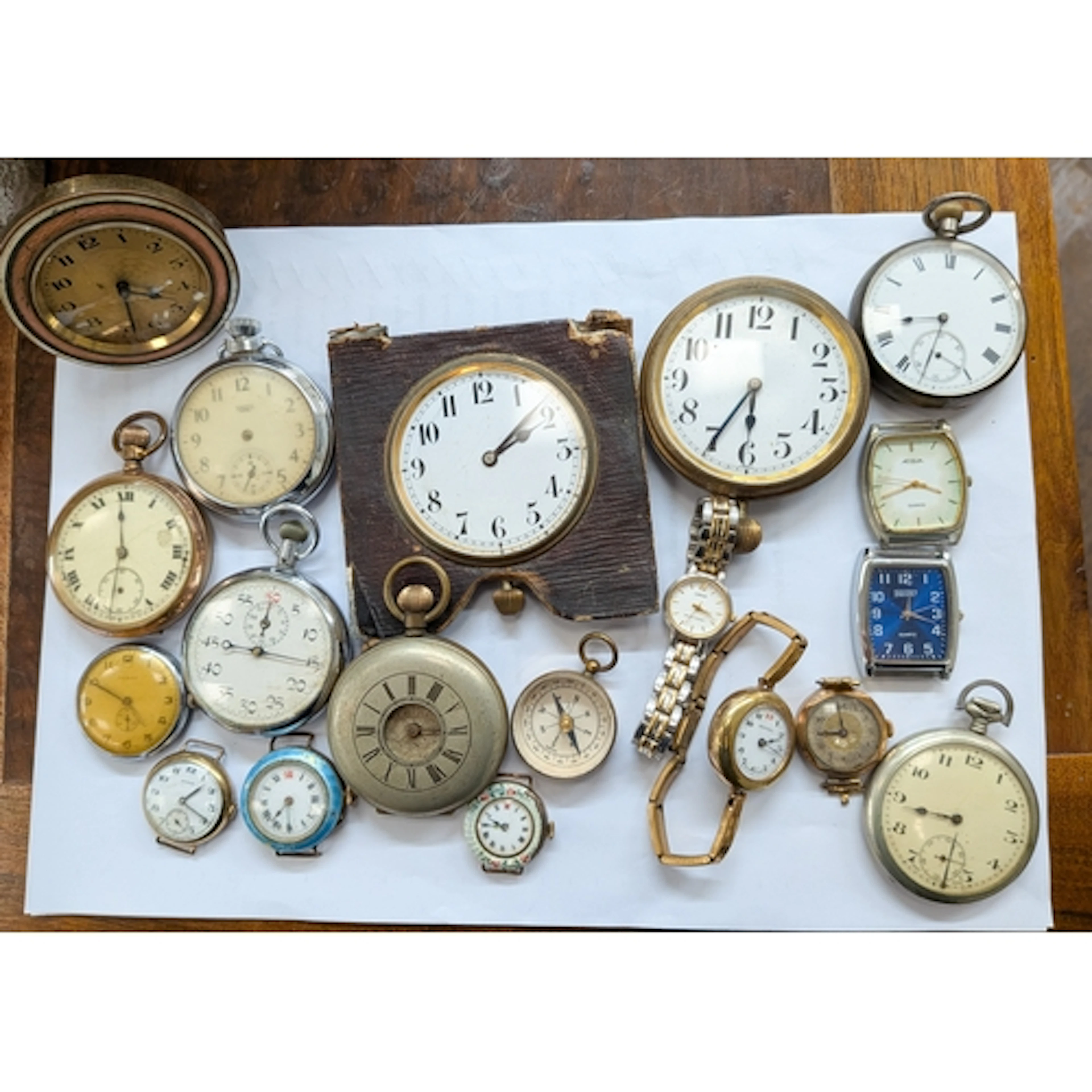 A collection of pocket watches and wristwatches