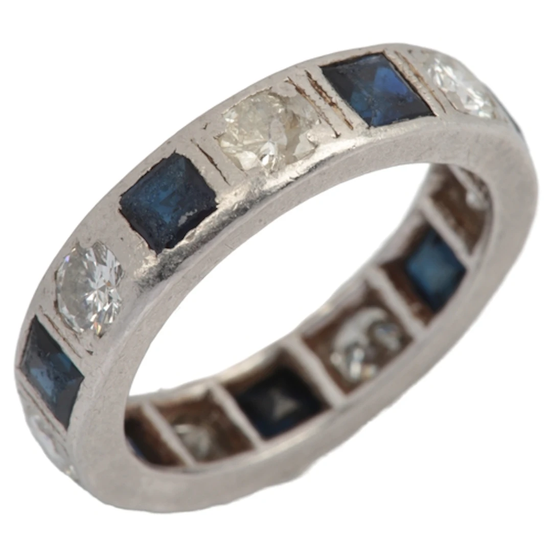 A sapphire and diamond eternity ring, designed as a continuo...