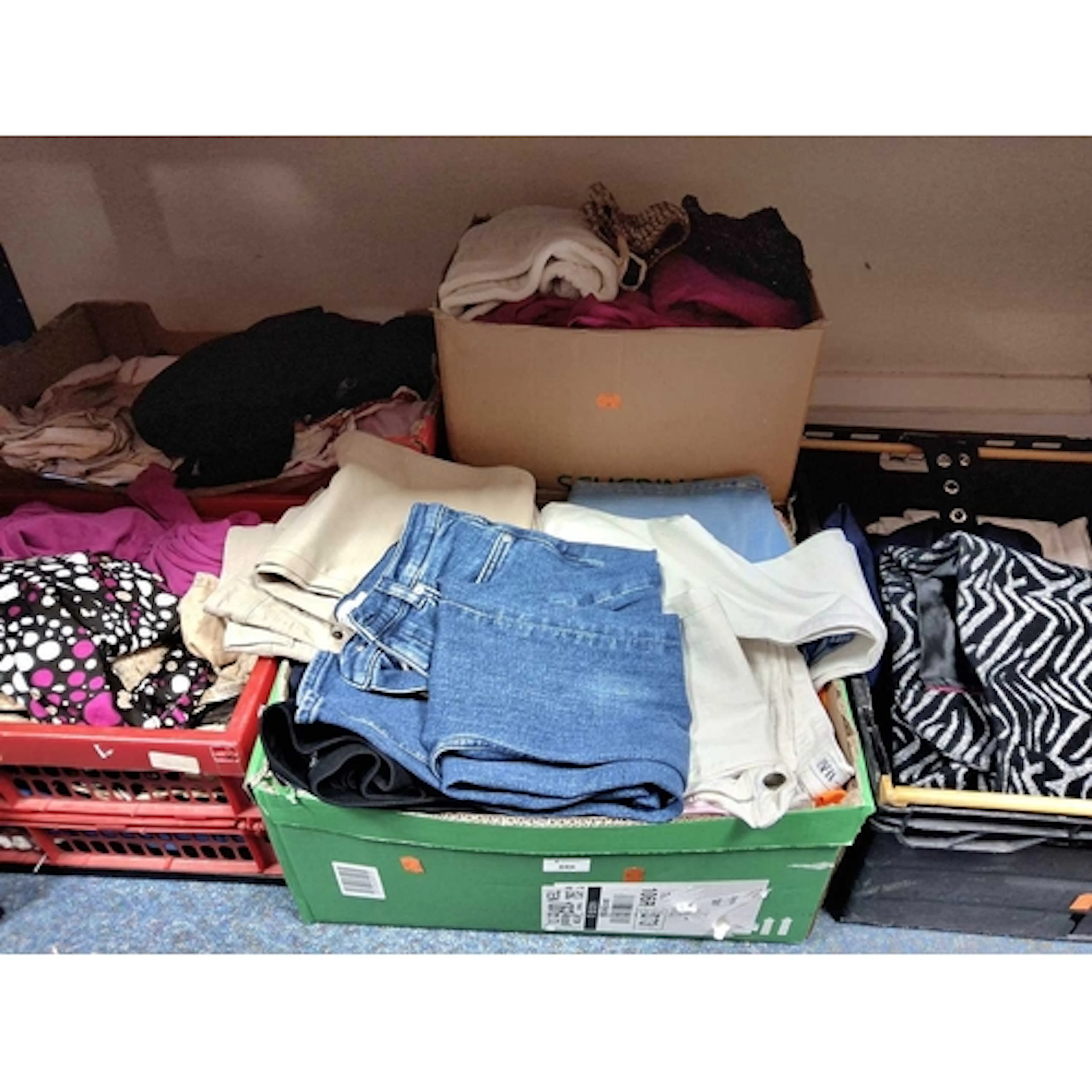 FIVE BOXES OF LADIES' CLOTHING, to include jeans, trousers, ...