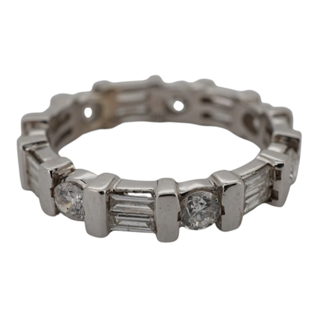 An eternity ring, designed as a continuous band of brilliant...