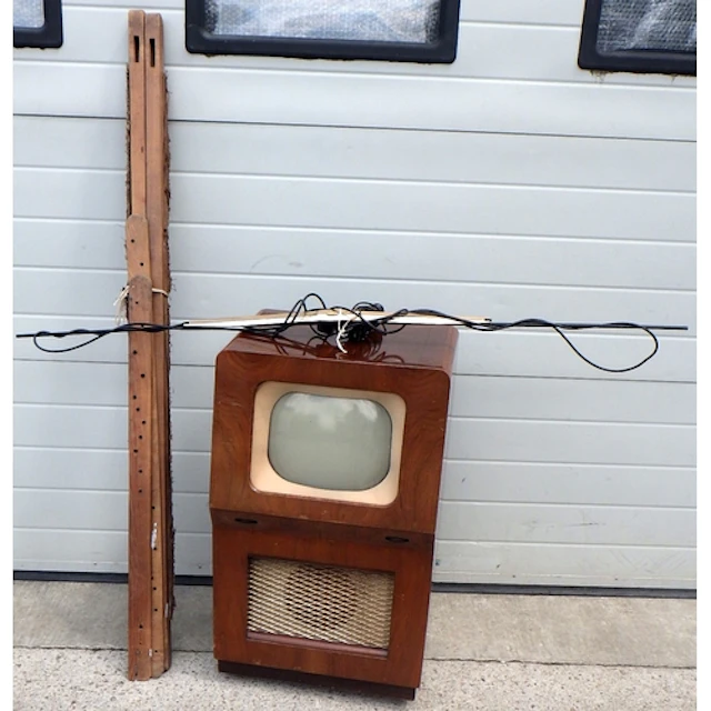 A vintage Pye tv (display only) together with a rug making f...