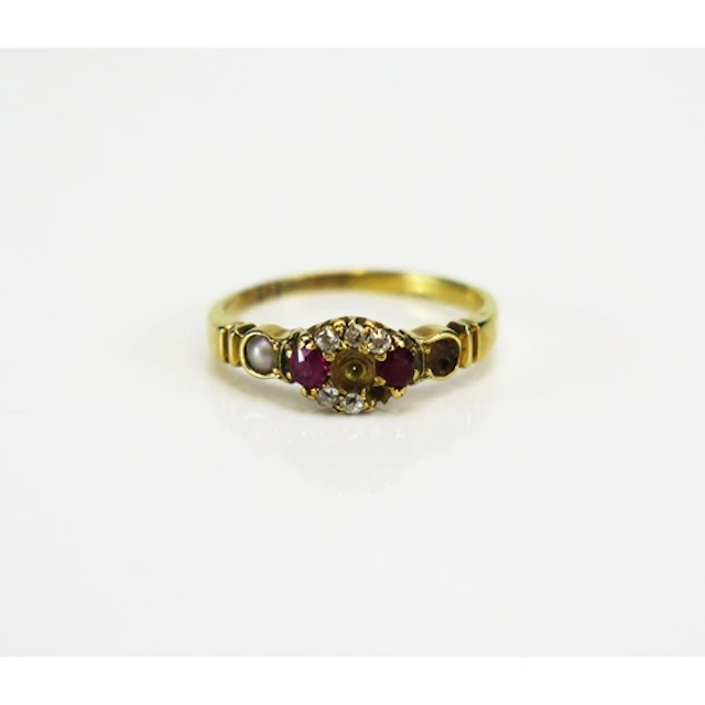A high carat precious yellow metal gem and paste set cluster...
