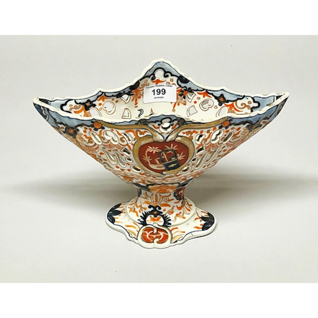 Japanese imari boat shaped pottery vase, with central cartou...