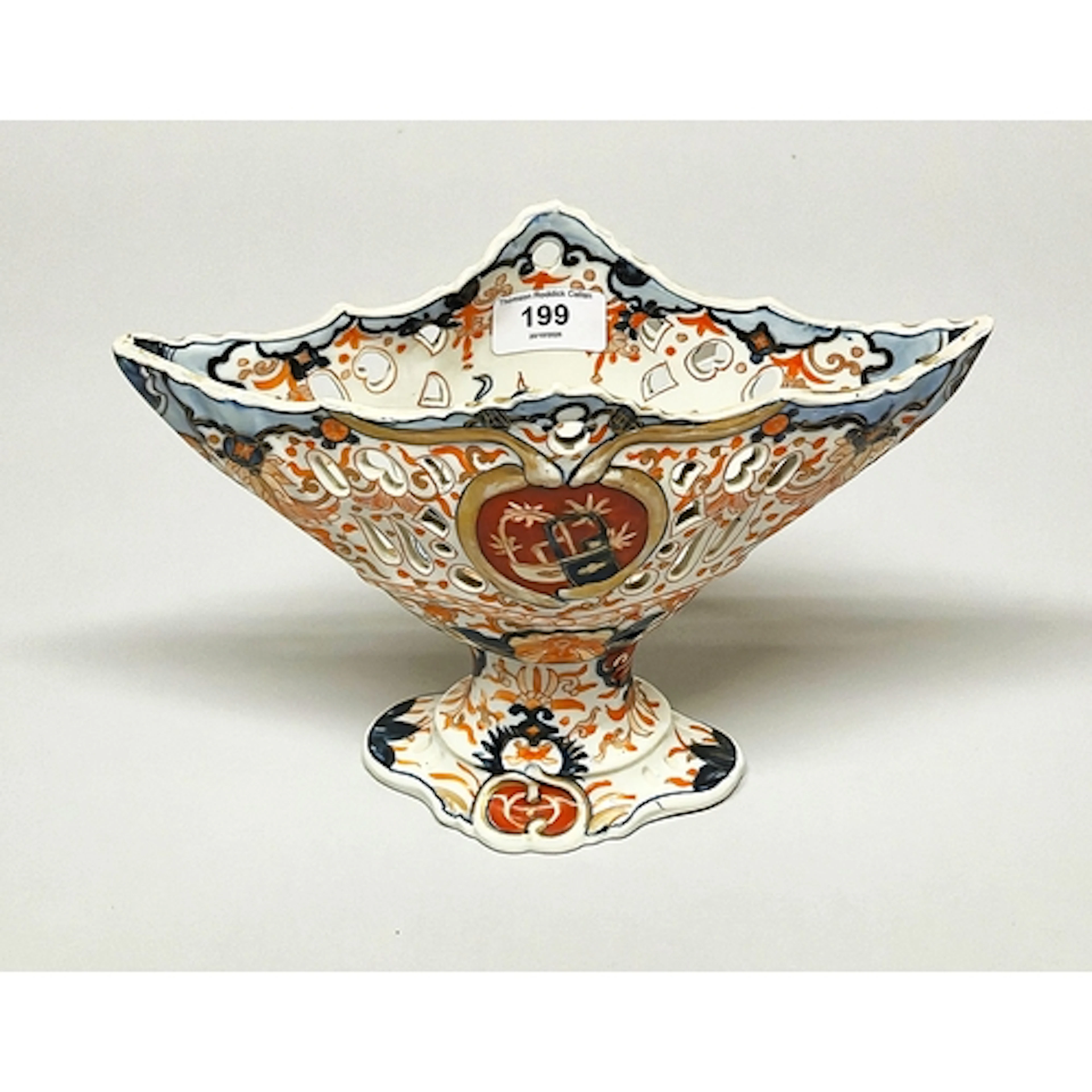 Japanese imari boat shaped pottery vase, with central cartou...