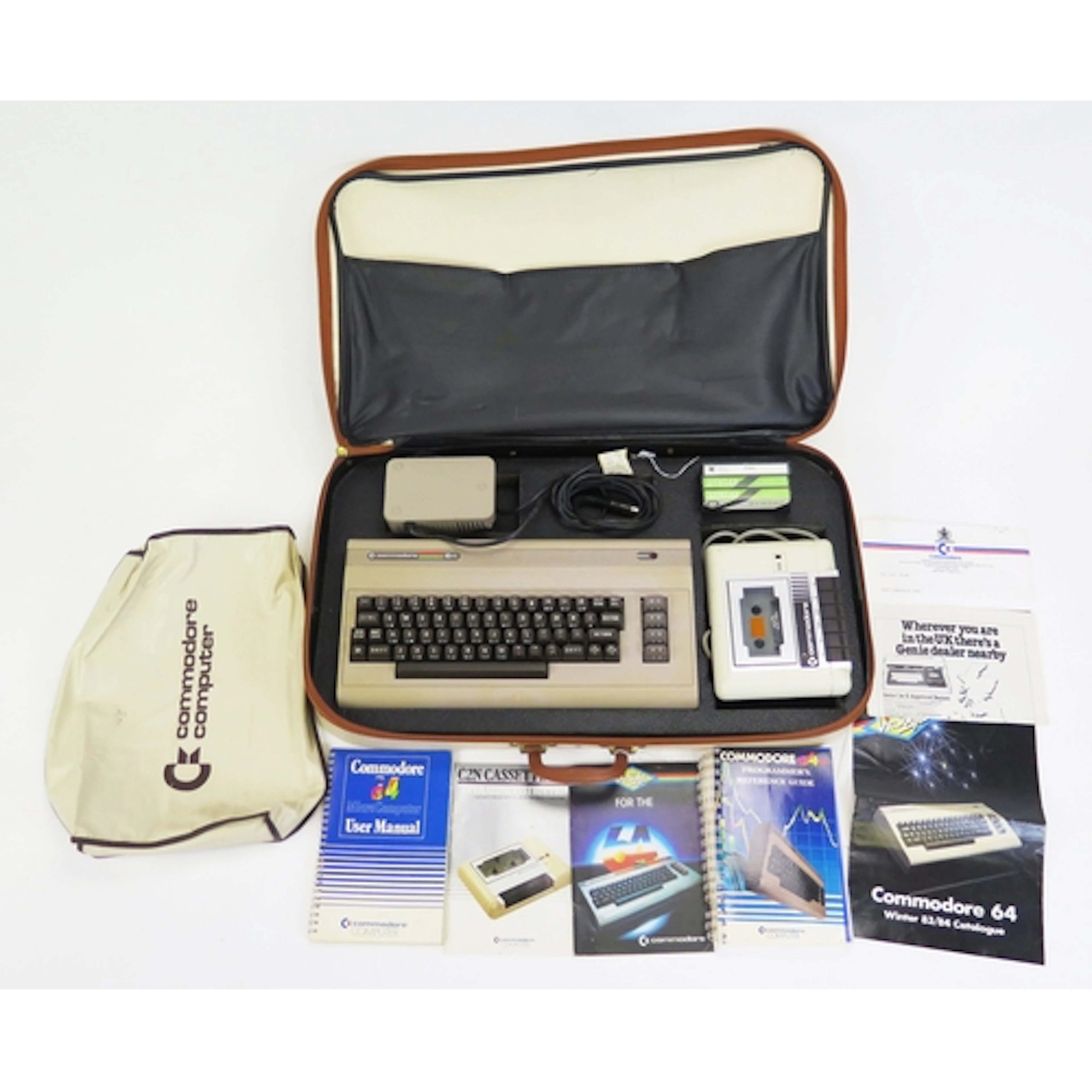 Commodore 64 Computer Group with Datasette, cassettes, bookl...