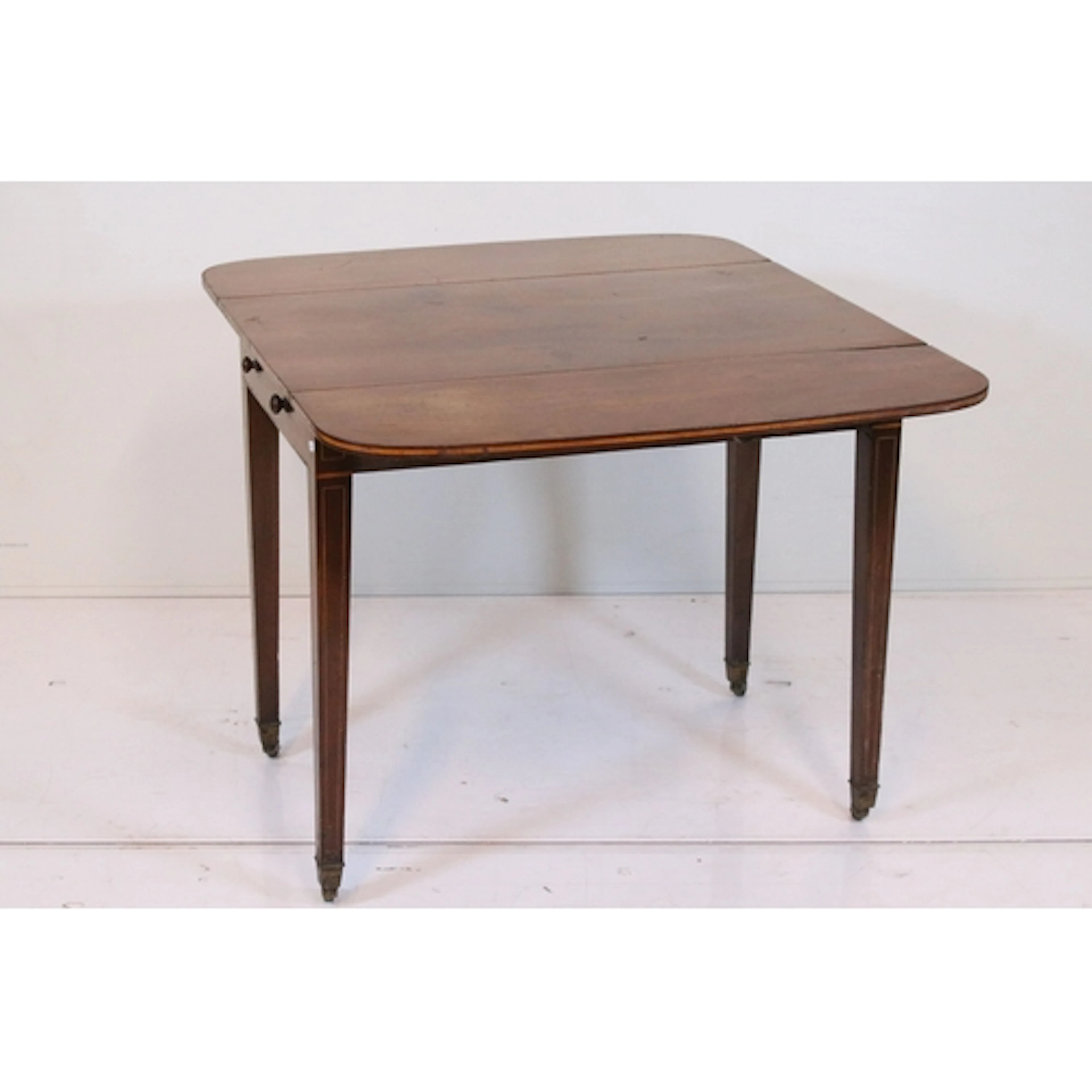Regency mahogany drop-flap table, having boxwood banded inla...
