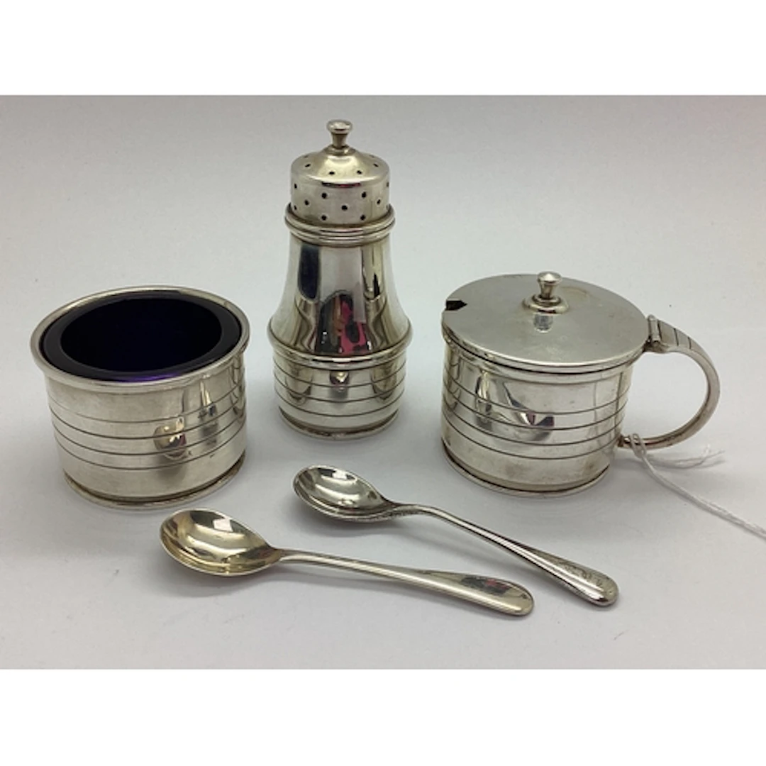 An Art Deco Hallmarked Silver Three Piece Cruet Set, Birming...