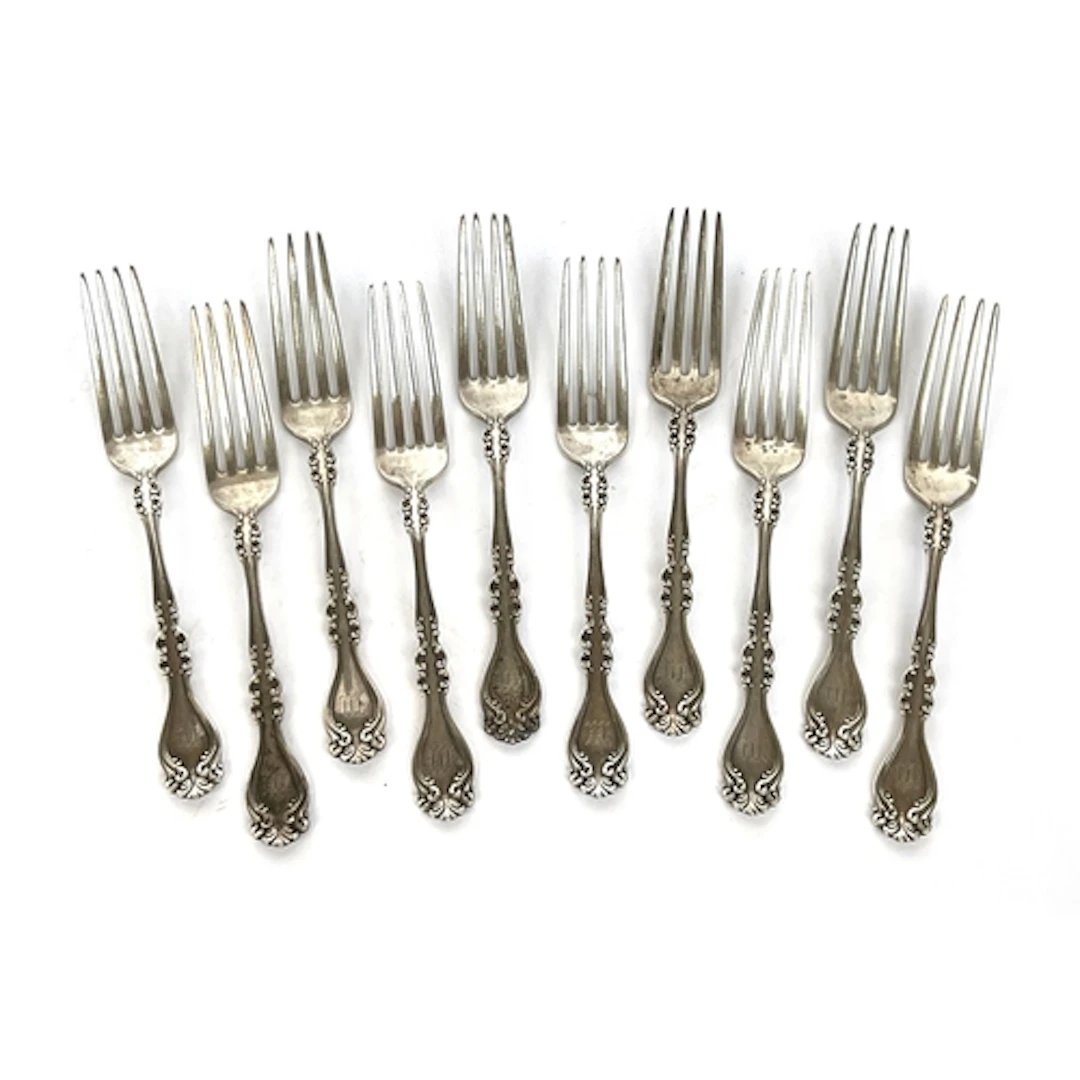 A lot of ten sterling silver dessert forks, 484g