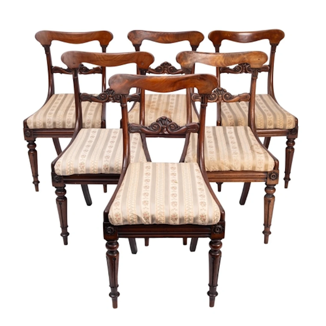 A set of six George IV mahogany dining chairs, circa 1825; e...