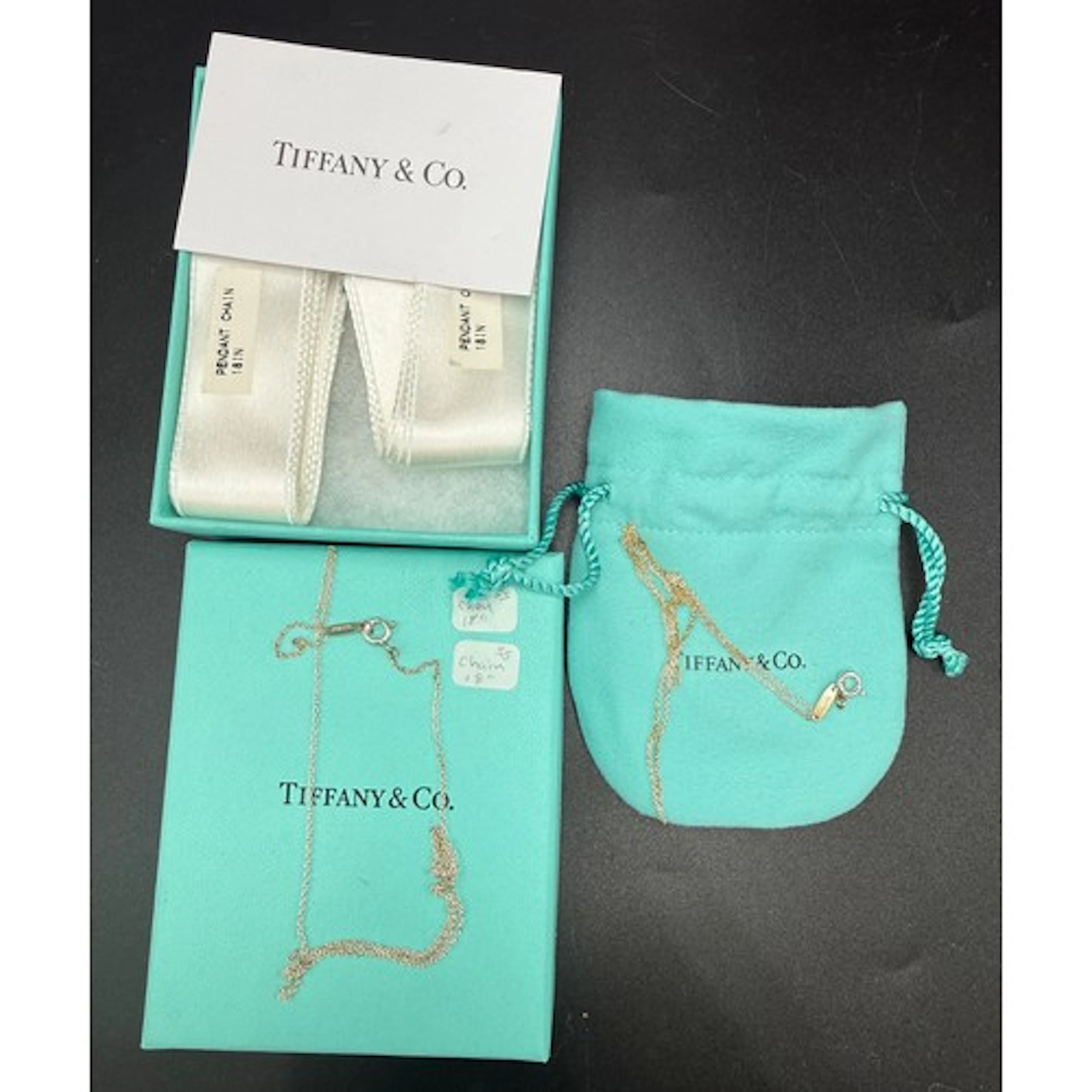 Two sterling silver Tiffany & Co chain necklaces with bag, b...