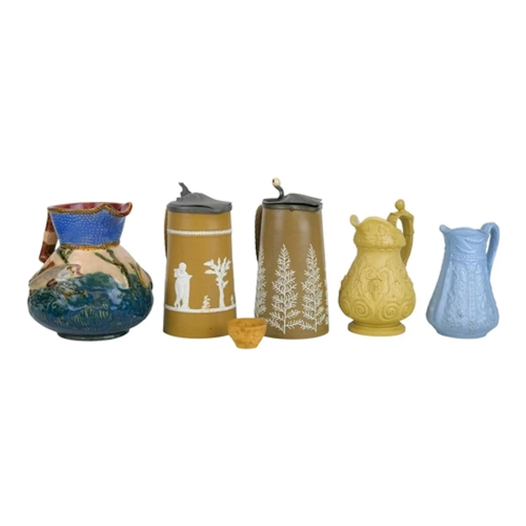 A 19th century polished basalt jug. The buff ground with app...