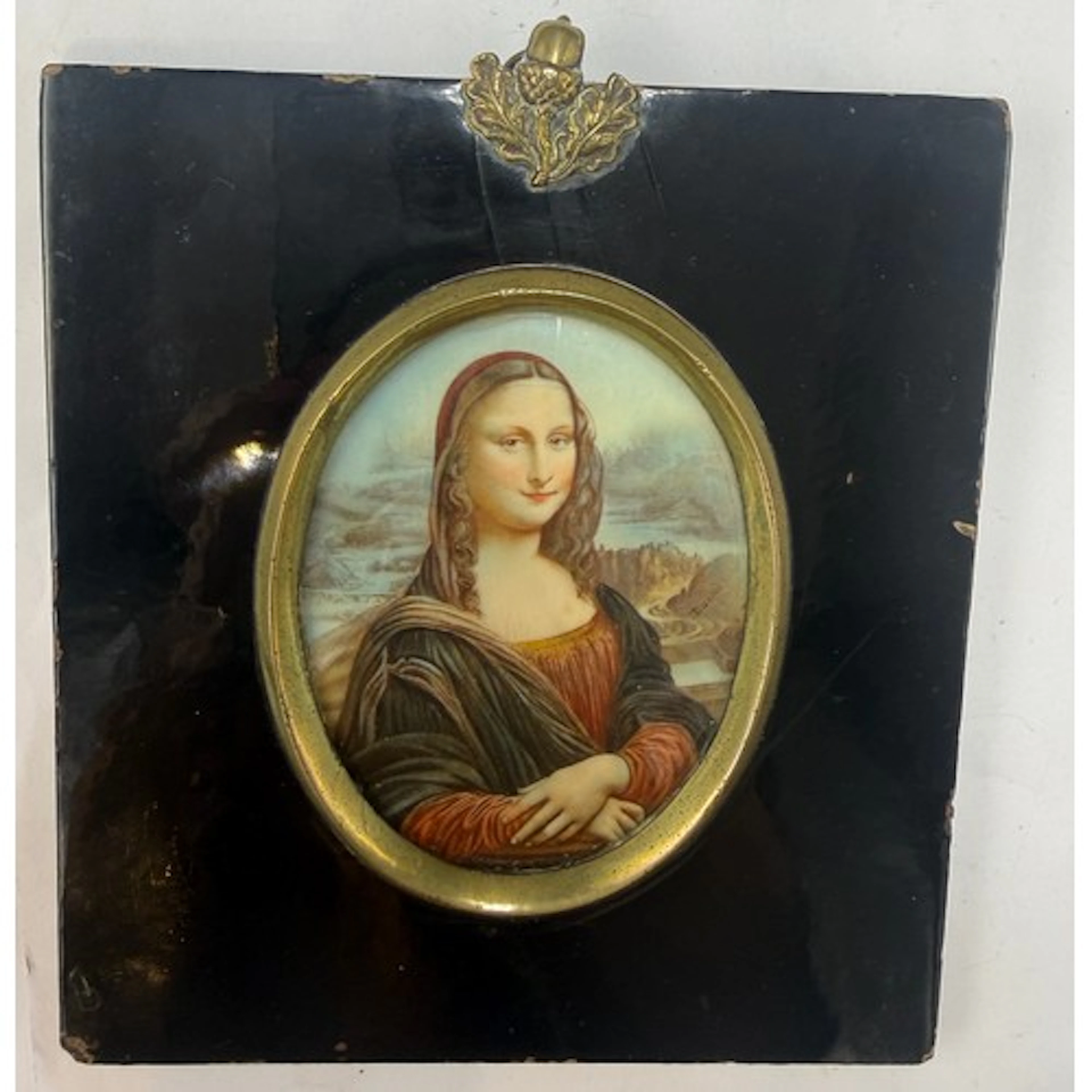 An ivory miniature depicting the Mona Lisa in an ebonised fr...