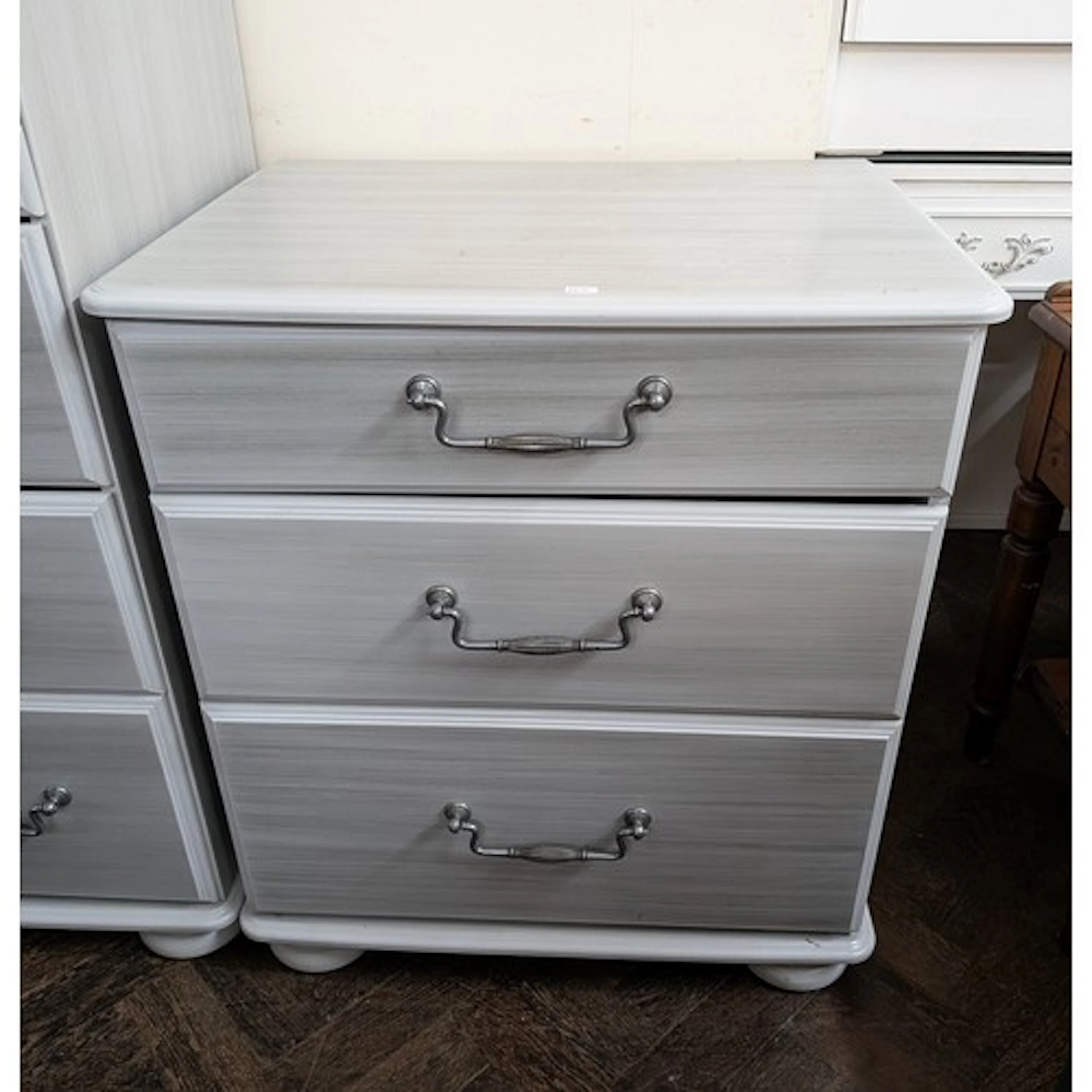 Modern silver grey bedside chest of three drawers matching t...