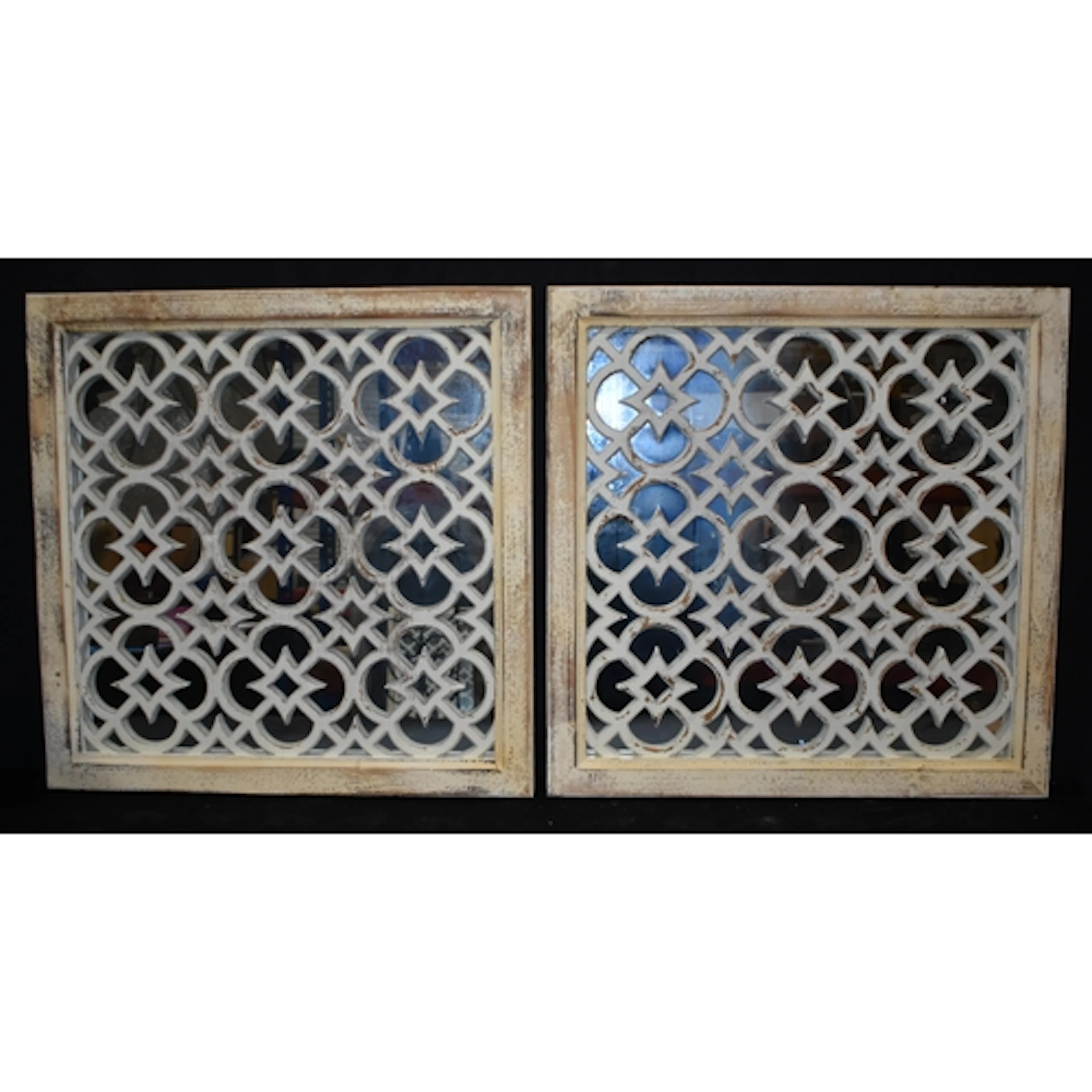 A pair of wooden Moroccan style mirrors 65 x 65cm (2)