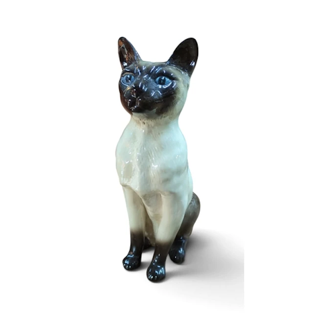 Beswick glazed ceramic figure of a seated Siamese cat, its c...