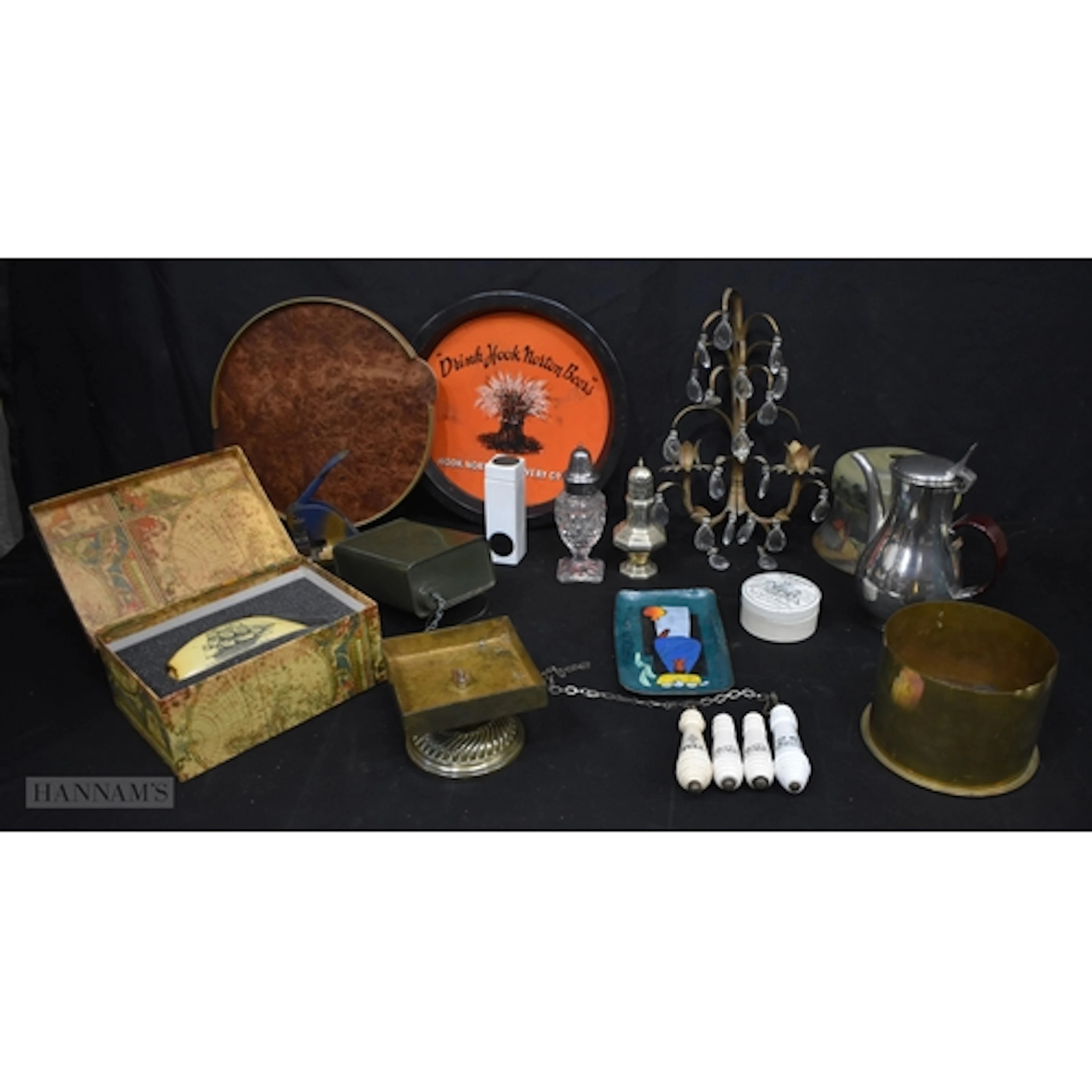 A miscellaneous collection of collectables trays, trench art...