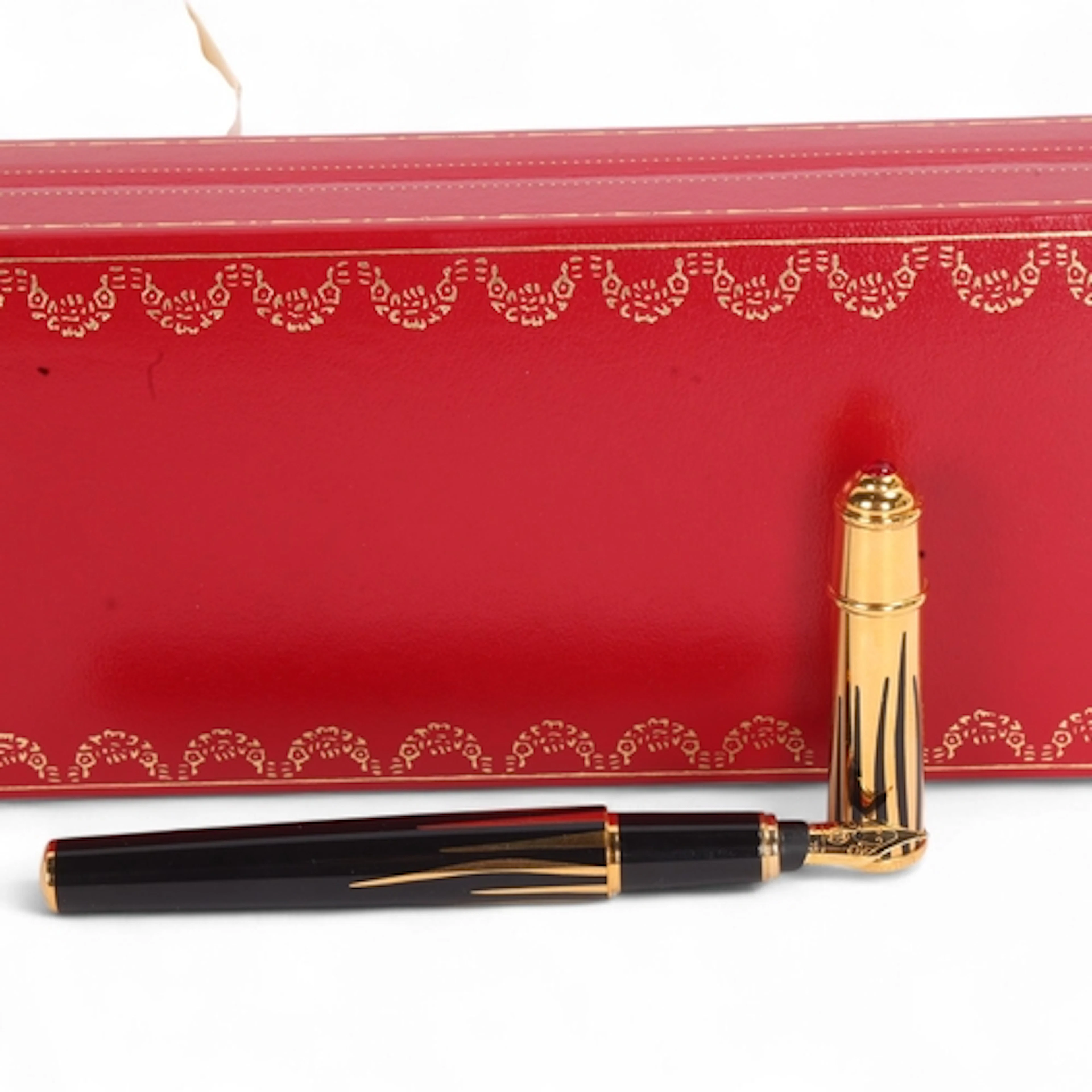 A Louis Cartier fountain pen, ladies Diablo de Cartier with ...