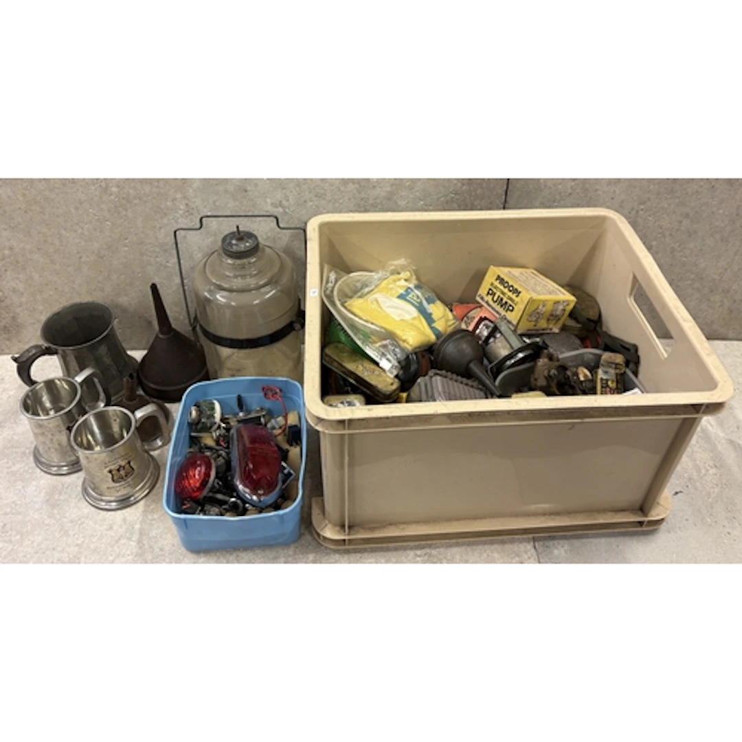 A box of motoring wonderments including spirit funnels, swit...
