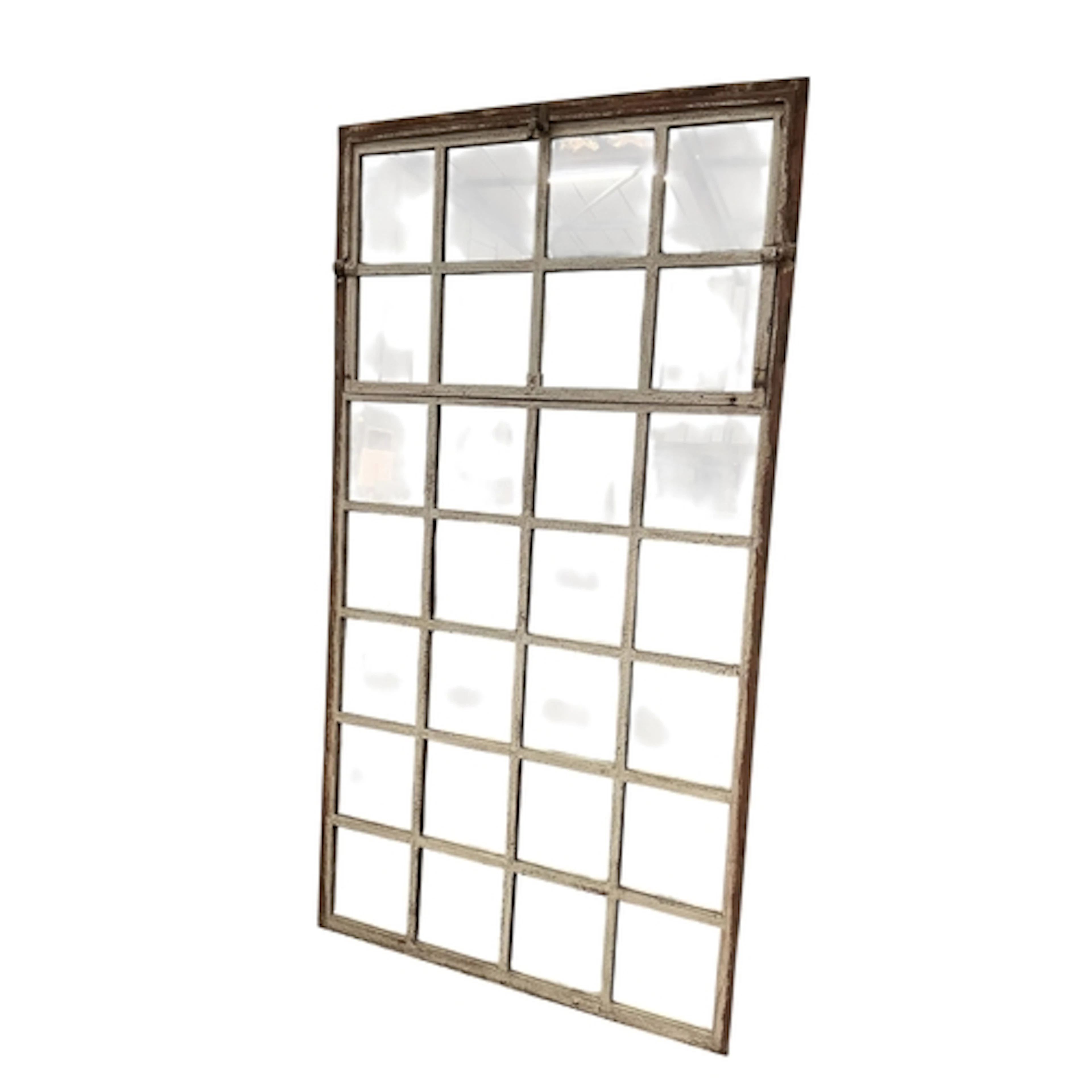 An industrial style rectangular cast iron window frame wall ...