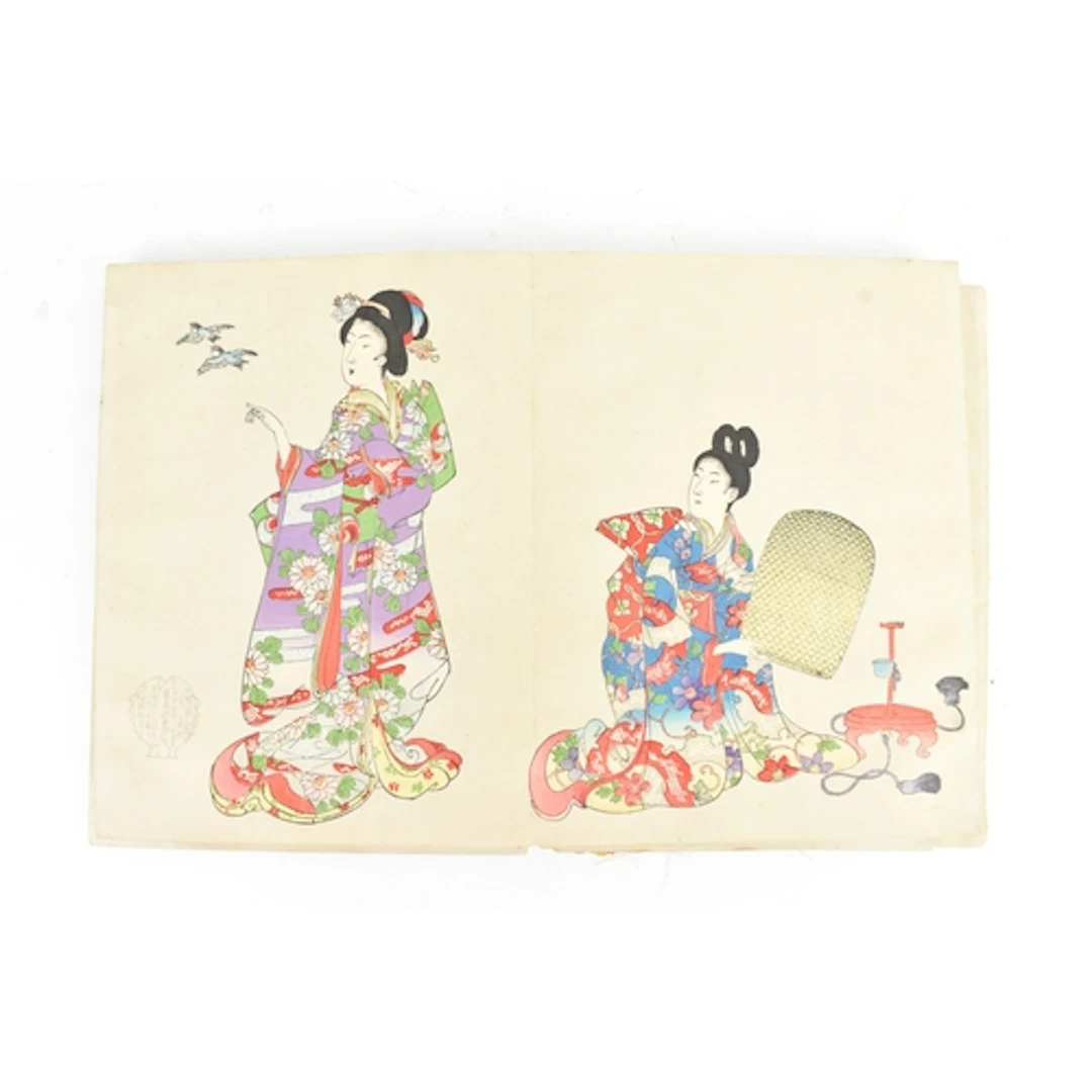 A Japanese Meiji period album of twelve colour woodblock pri...