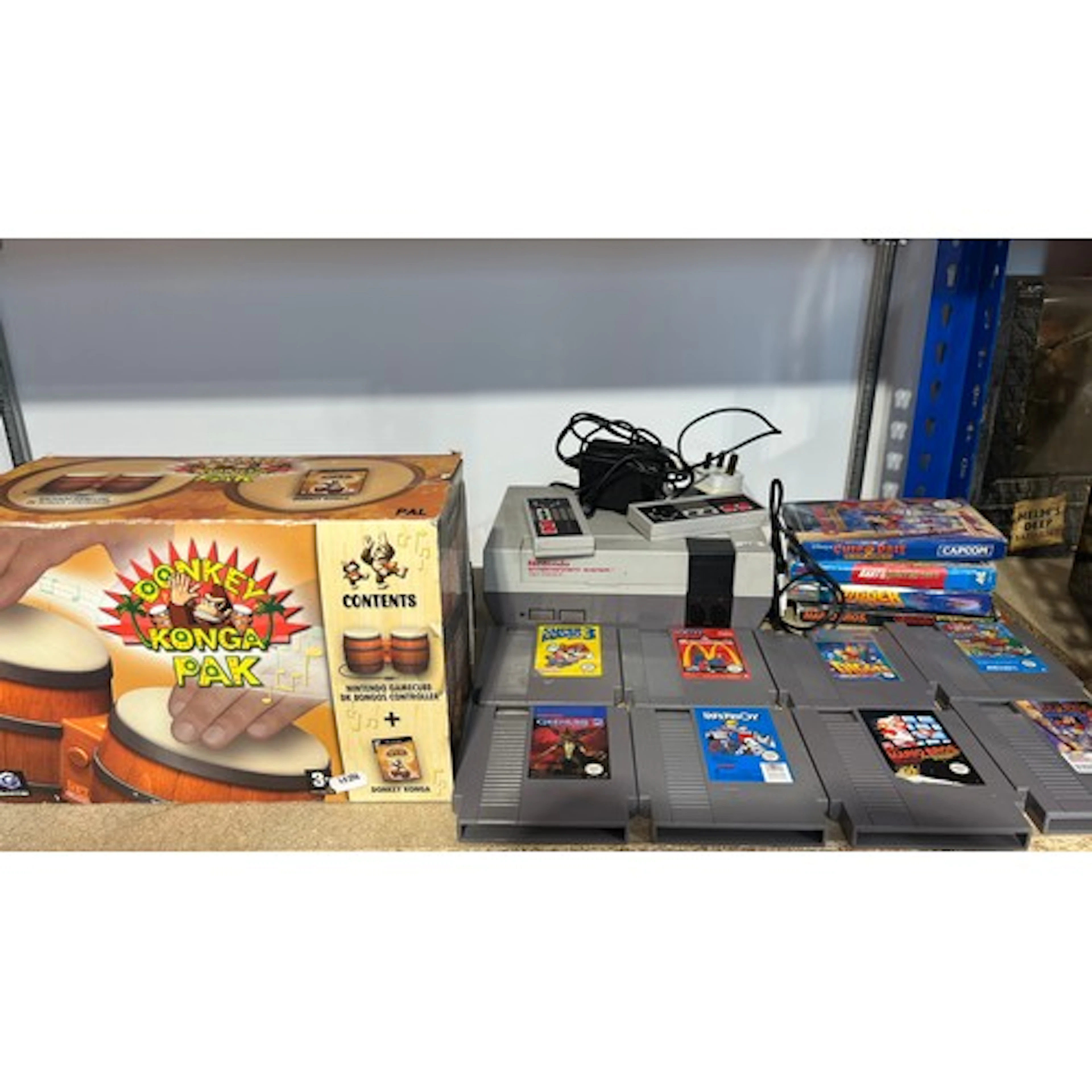 Nintendo Entertainment System NES games console with two con...