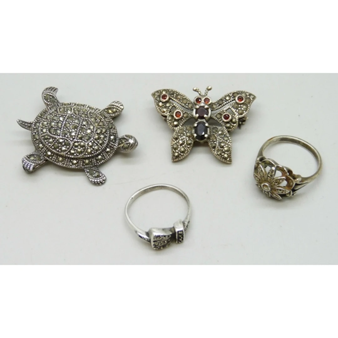 Silver and marcasite jewellery - two rings, a tortoise desig...