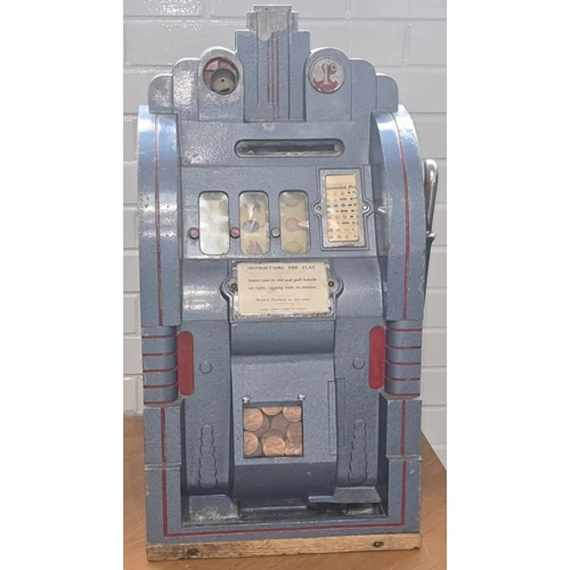 Vintage Mills Extraordinaire penny slot machine. Plays 1D. I...