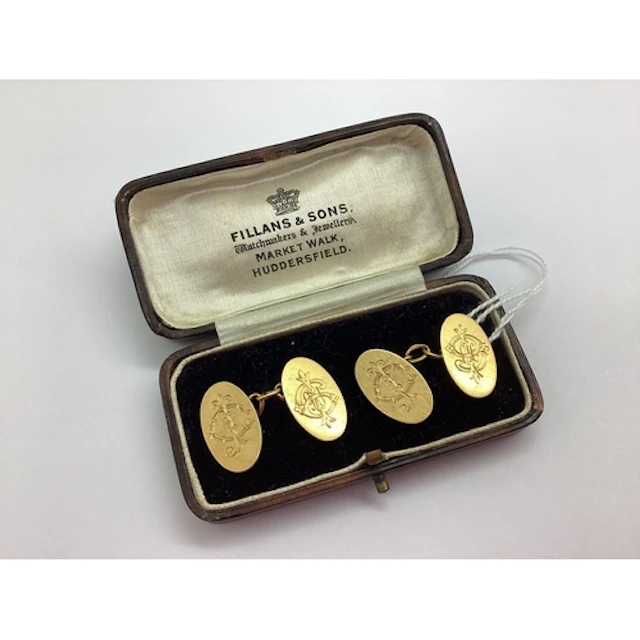 A Pair of 18ct Gold Cufflinks, the monogrammed oval panels o...