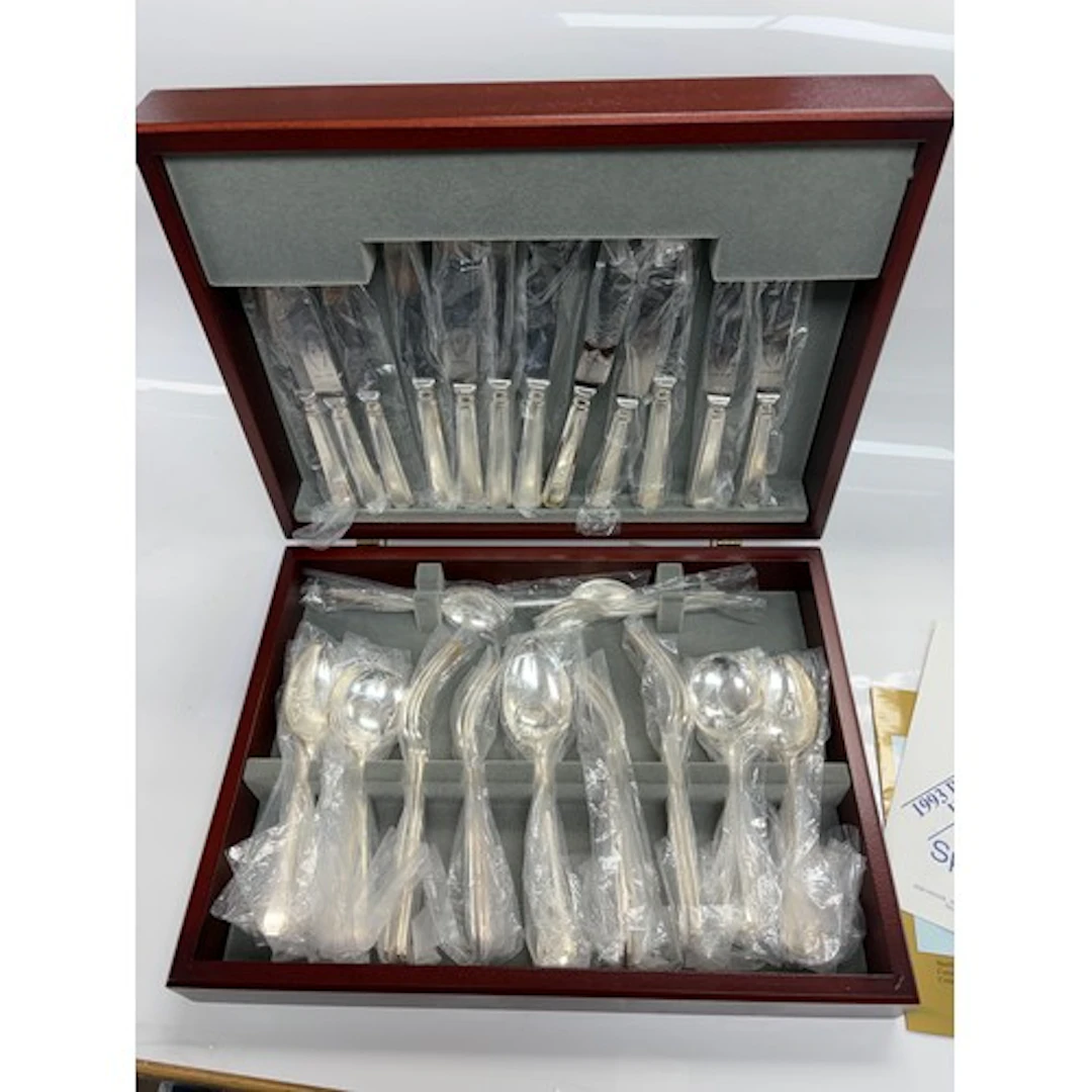 A cased canteen of Tudor cutlery