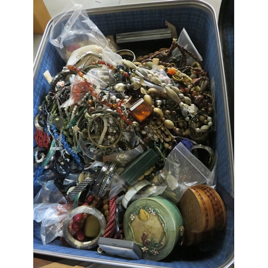 Suitcase containing a large quantity of costume jewellery