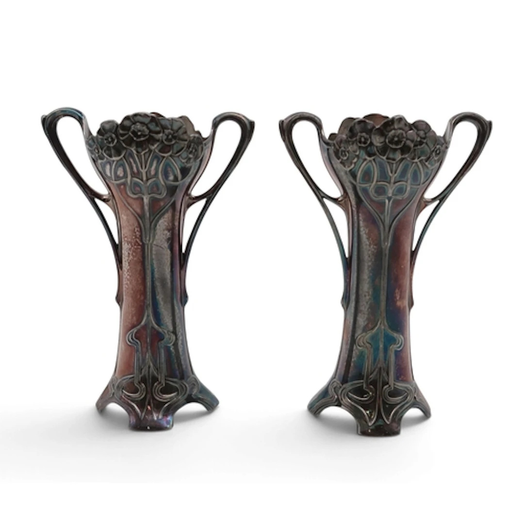 A pair of WMF silver plated spill vases