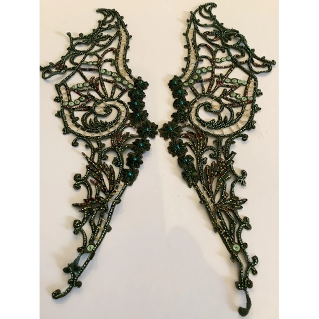 A collection of green and bronze metallic beading to include...