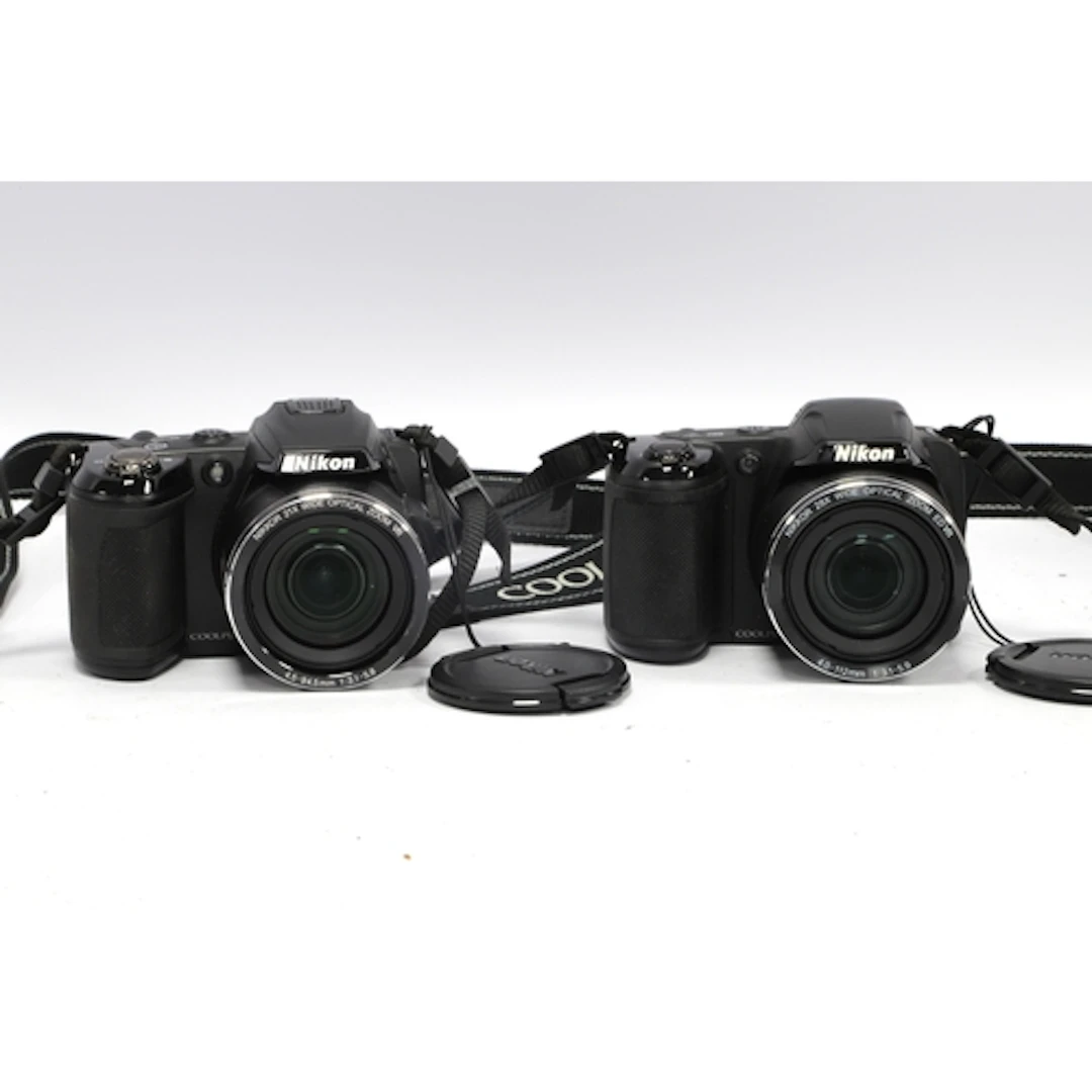 Nikon Coolpix L340 Digital Bridge Camera together with a Nik...