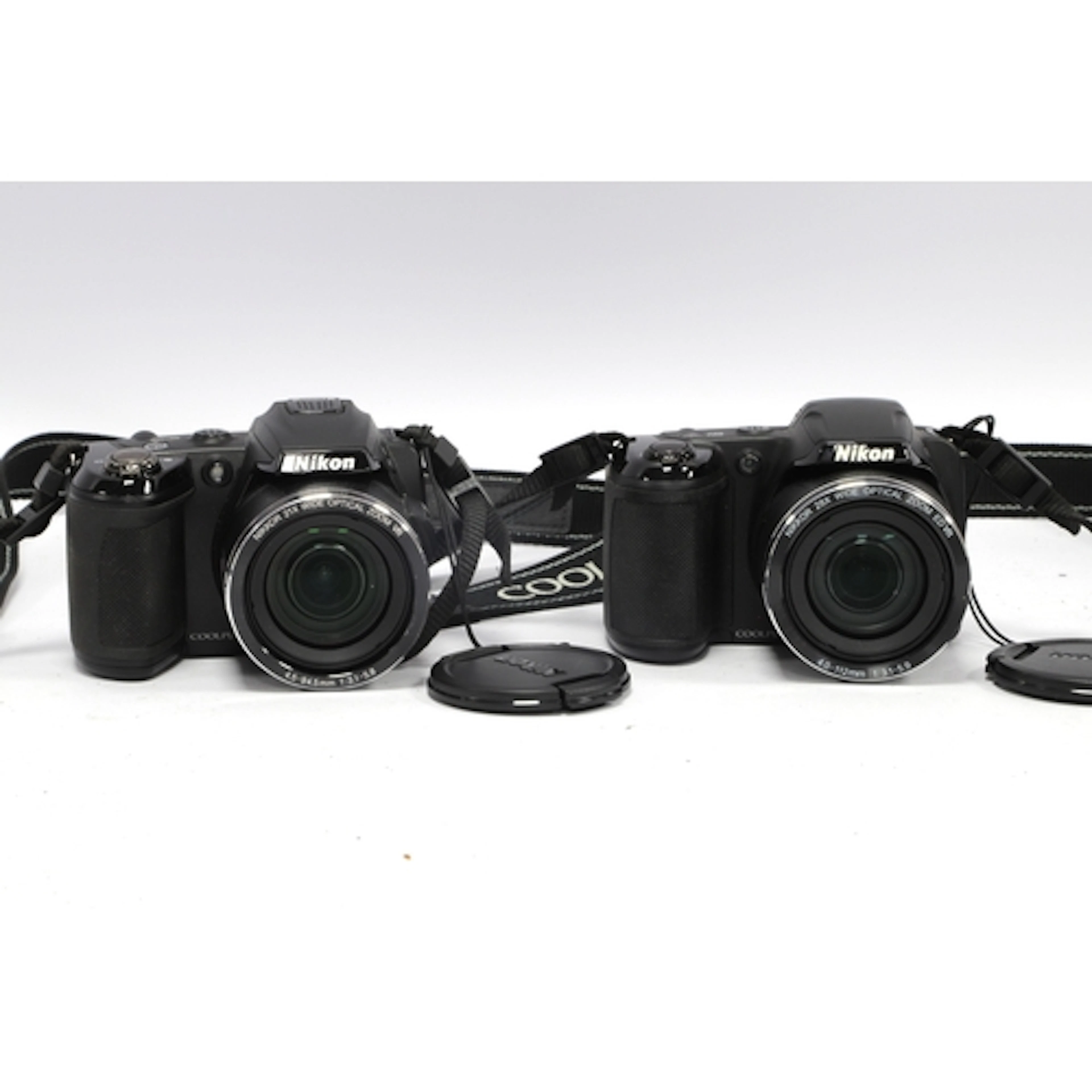 Nikon Coolpix L340 Digital Bridge Camera together with a Nik...
