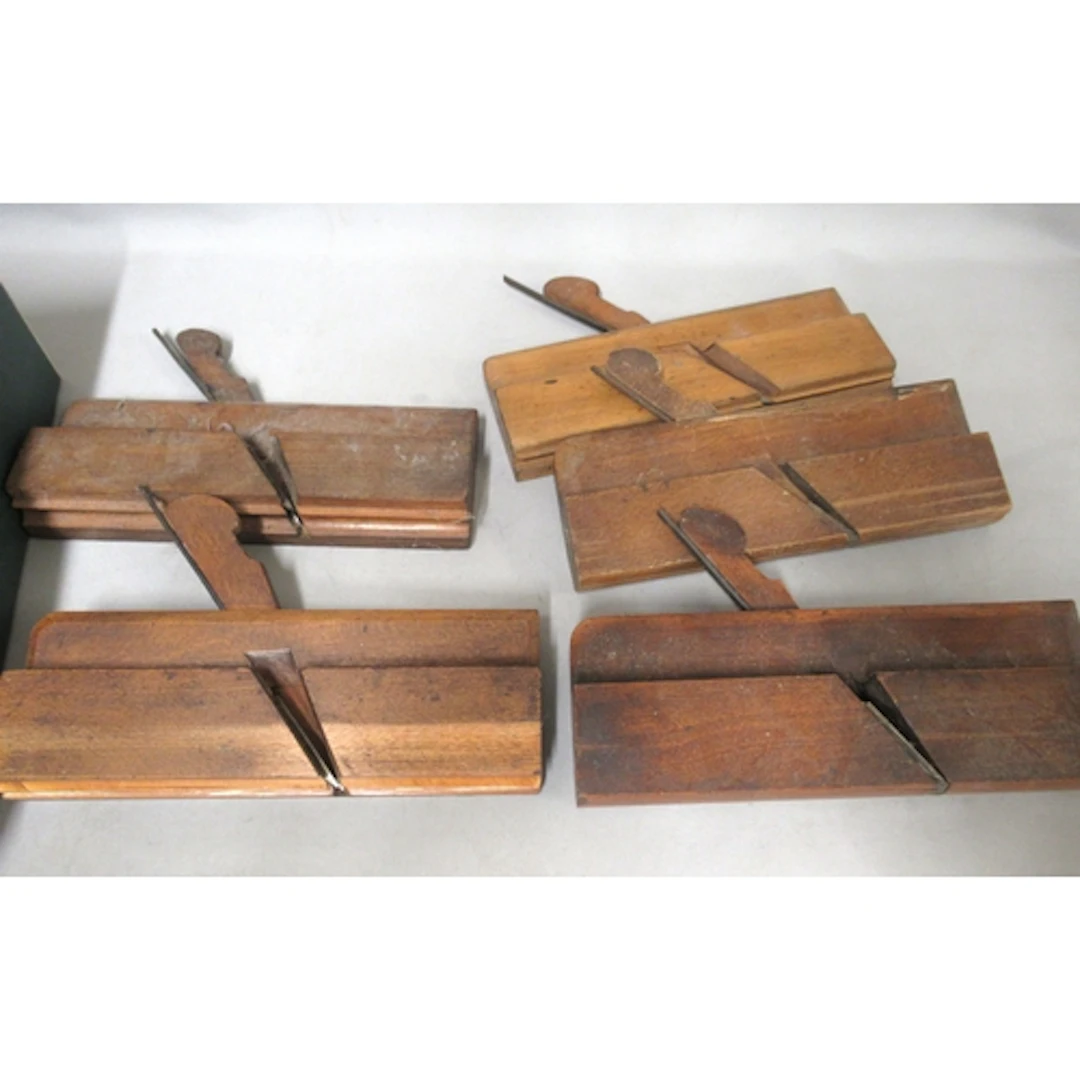 Small quantity of antique wooden moulding planes