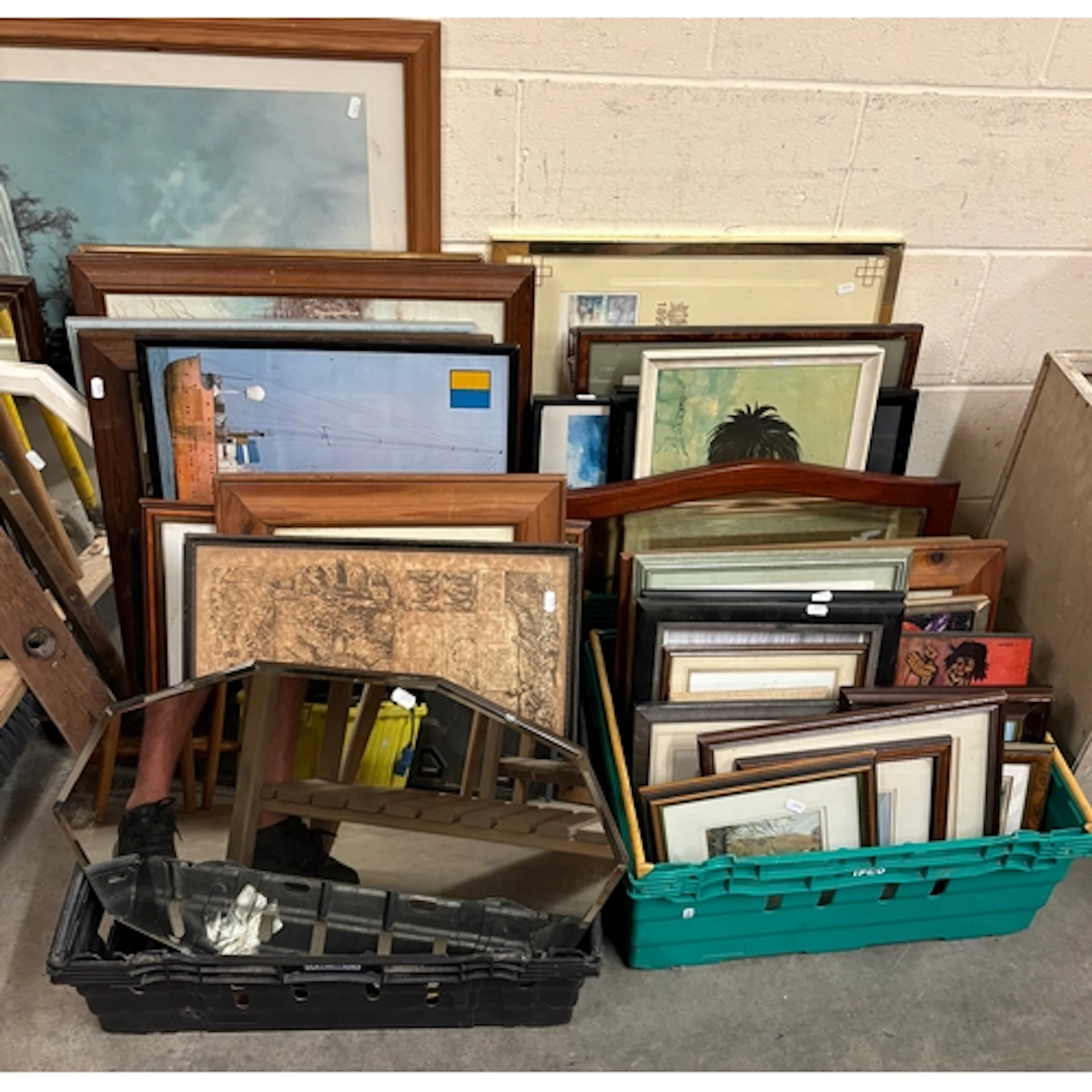 A large qty of mirrors, prints etc