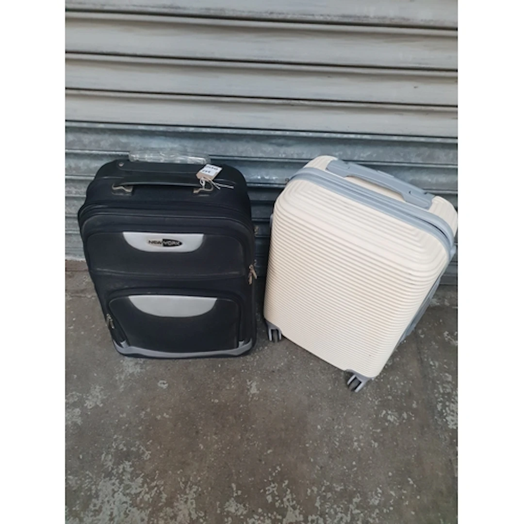 TWO SUITCASES including Newtork Note: cases and bags are em...