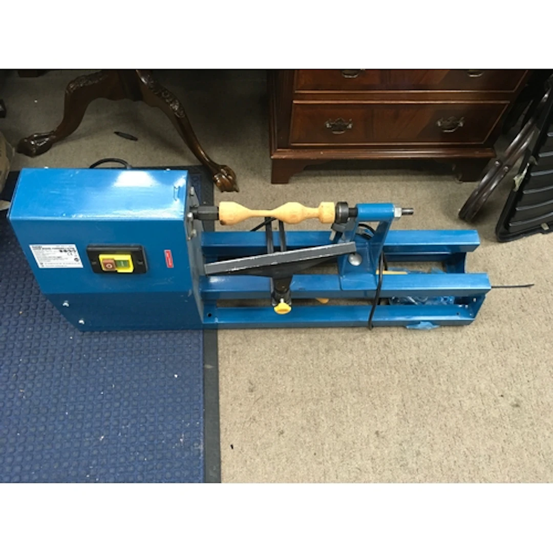 A Workzone extending wood turning lathe