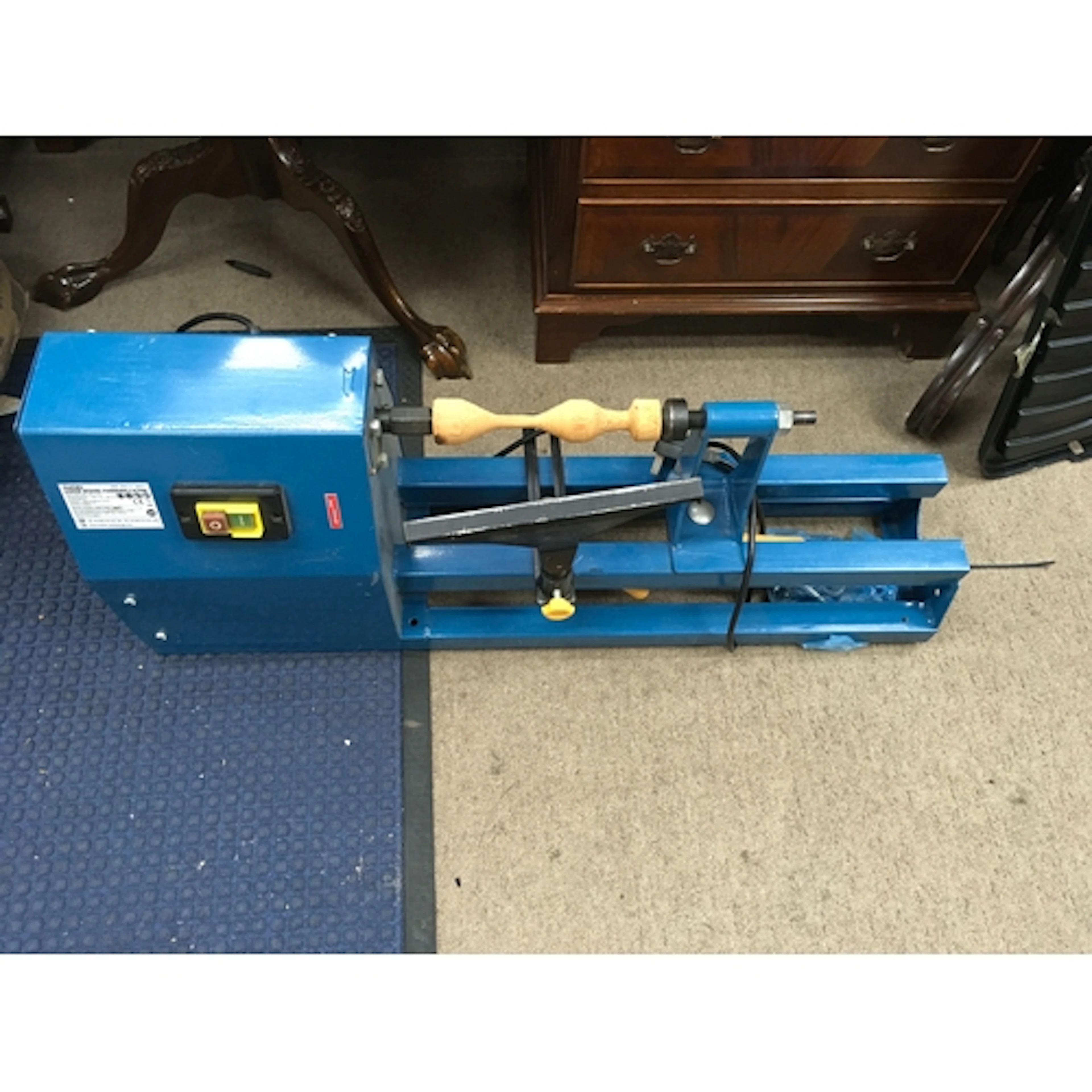 A Workzone extending wood turning lathe