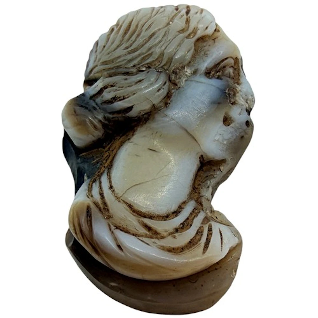 A carved hardstone cameo portrait of a Roman woman, probably...