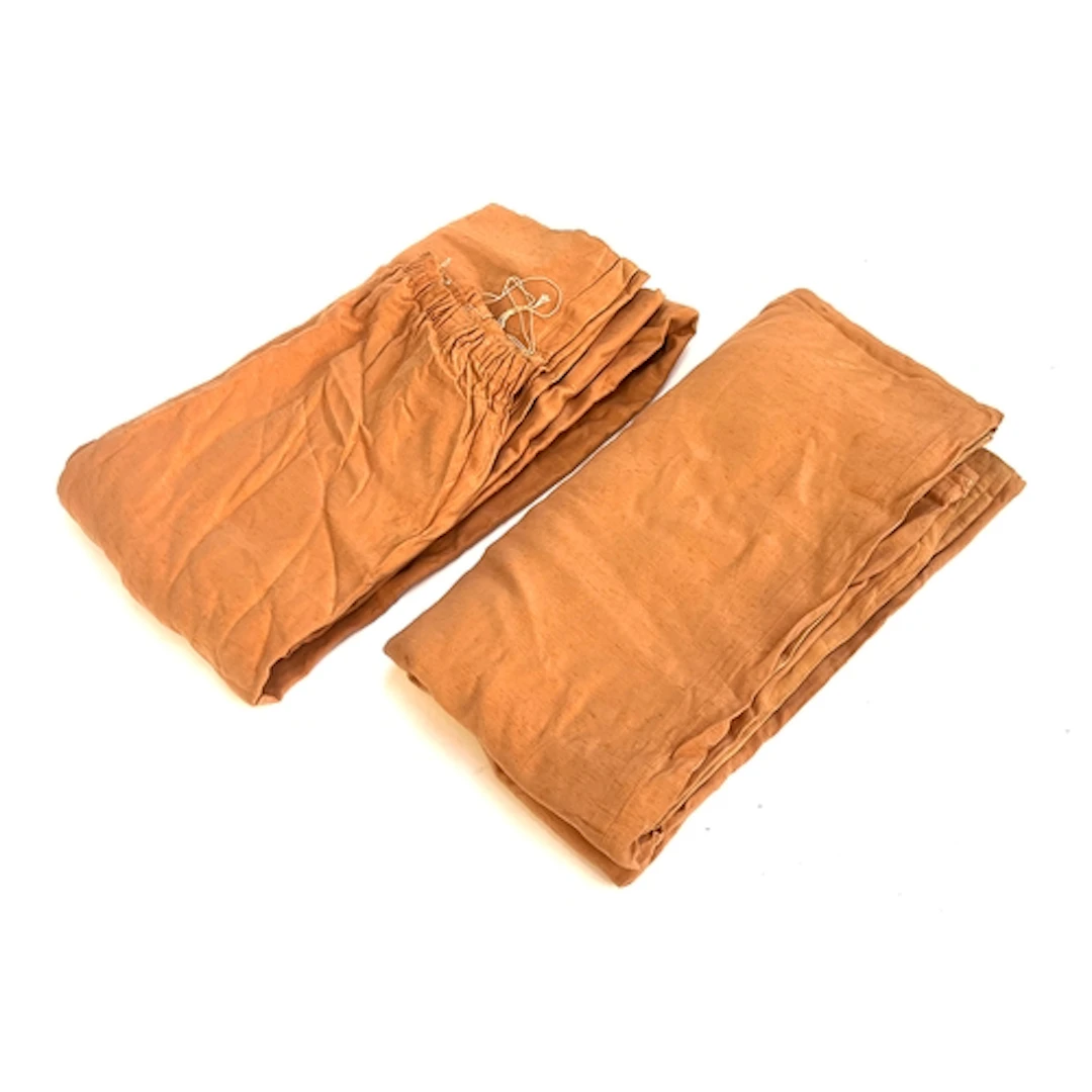 A pair of silk curtains in a light salmon pink, approx. 215c...