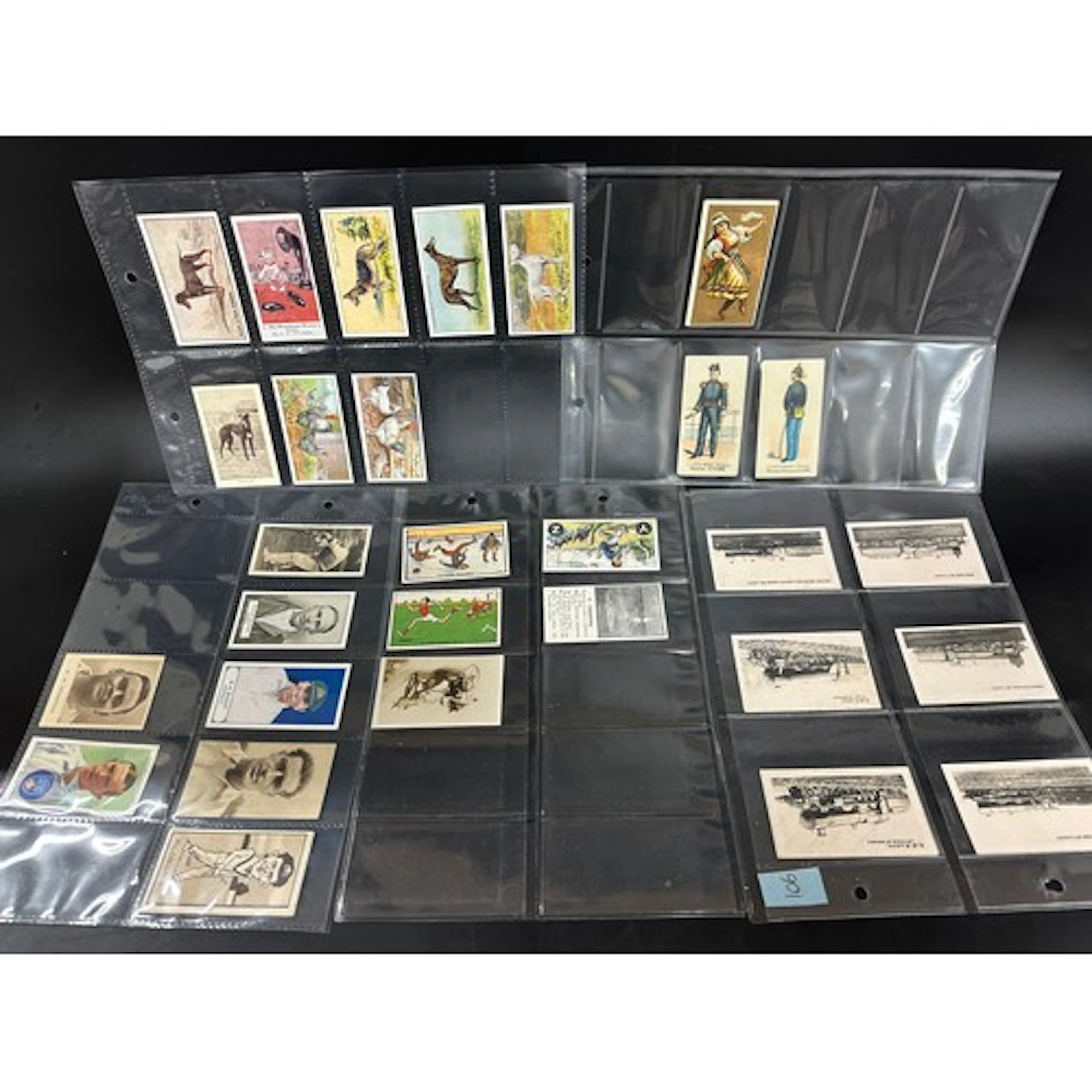 A collection of assorted trade/cigarette cards including Nel...