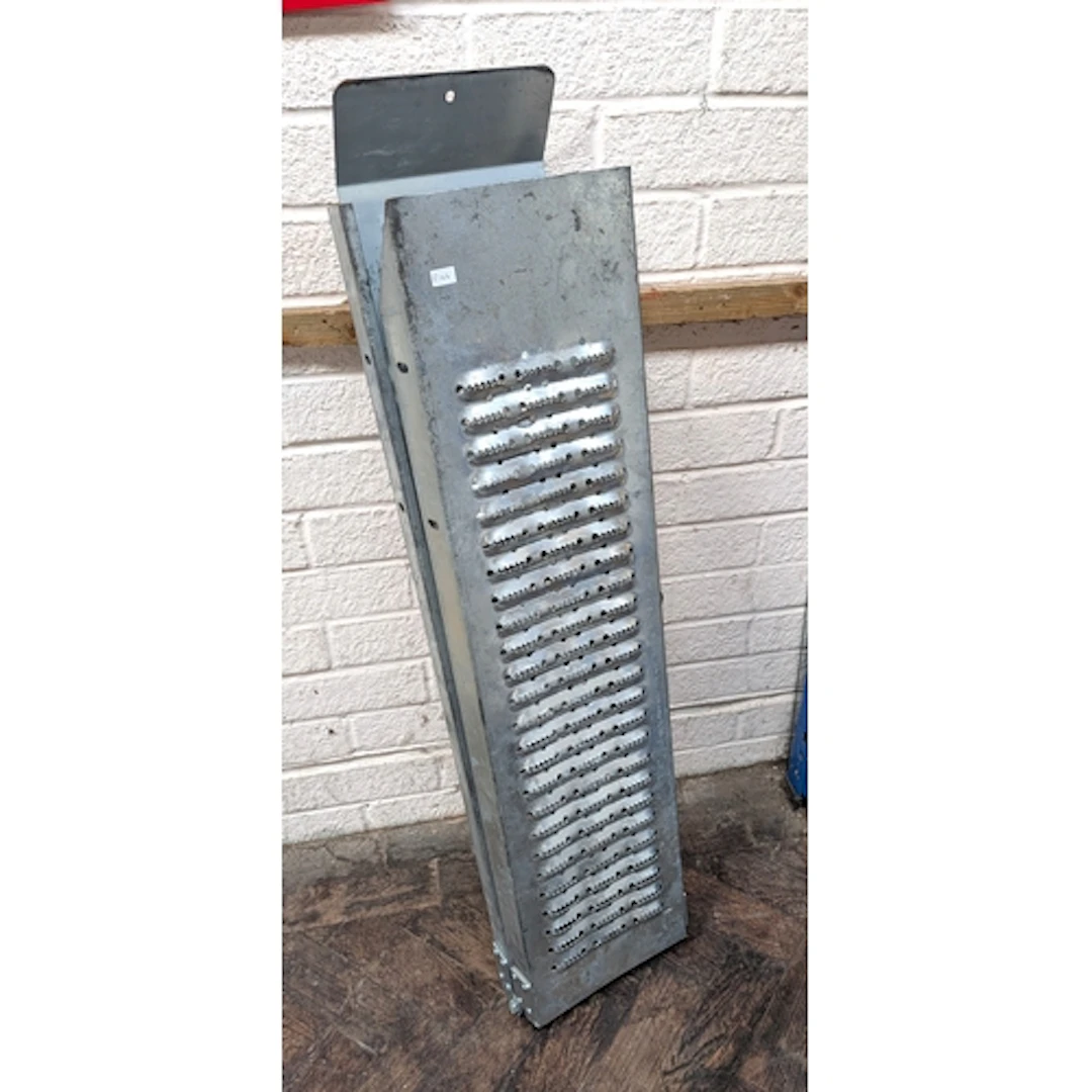 An aluminum folding ramp