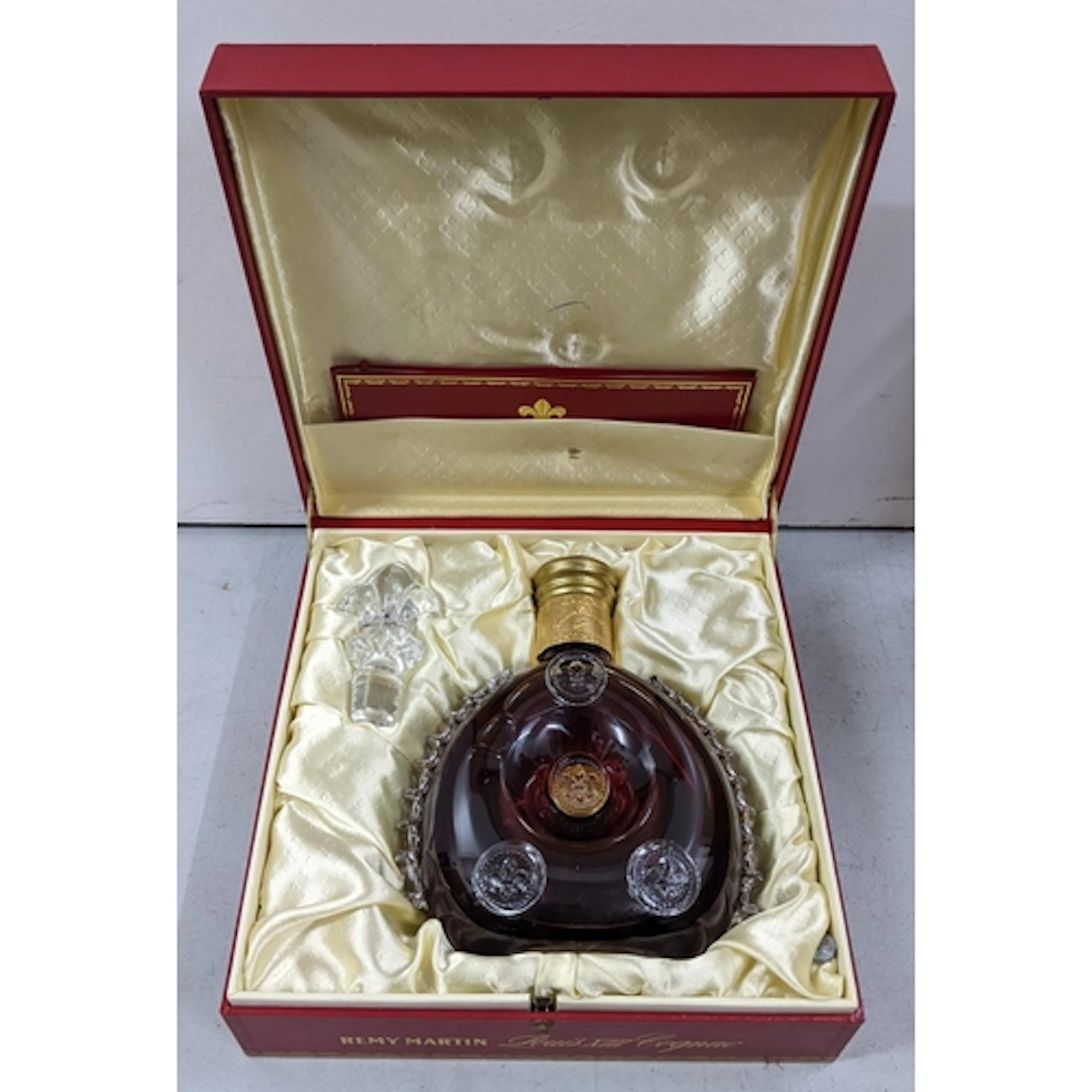 A bottle of Rémy Martin Louis XIII Grande Champagne Cognac, ...