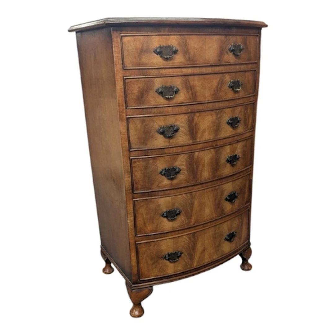 An early 20th century Queen Anne revival wallnut tallboy che...