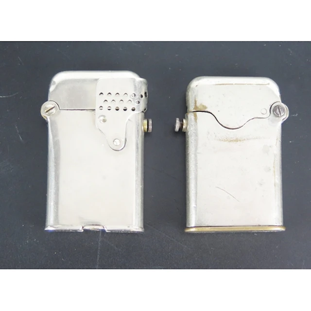 Two Thorens petrol lighters. WE DO NOT POST THESE ITEMS IN ...