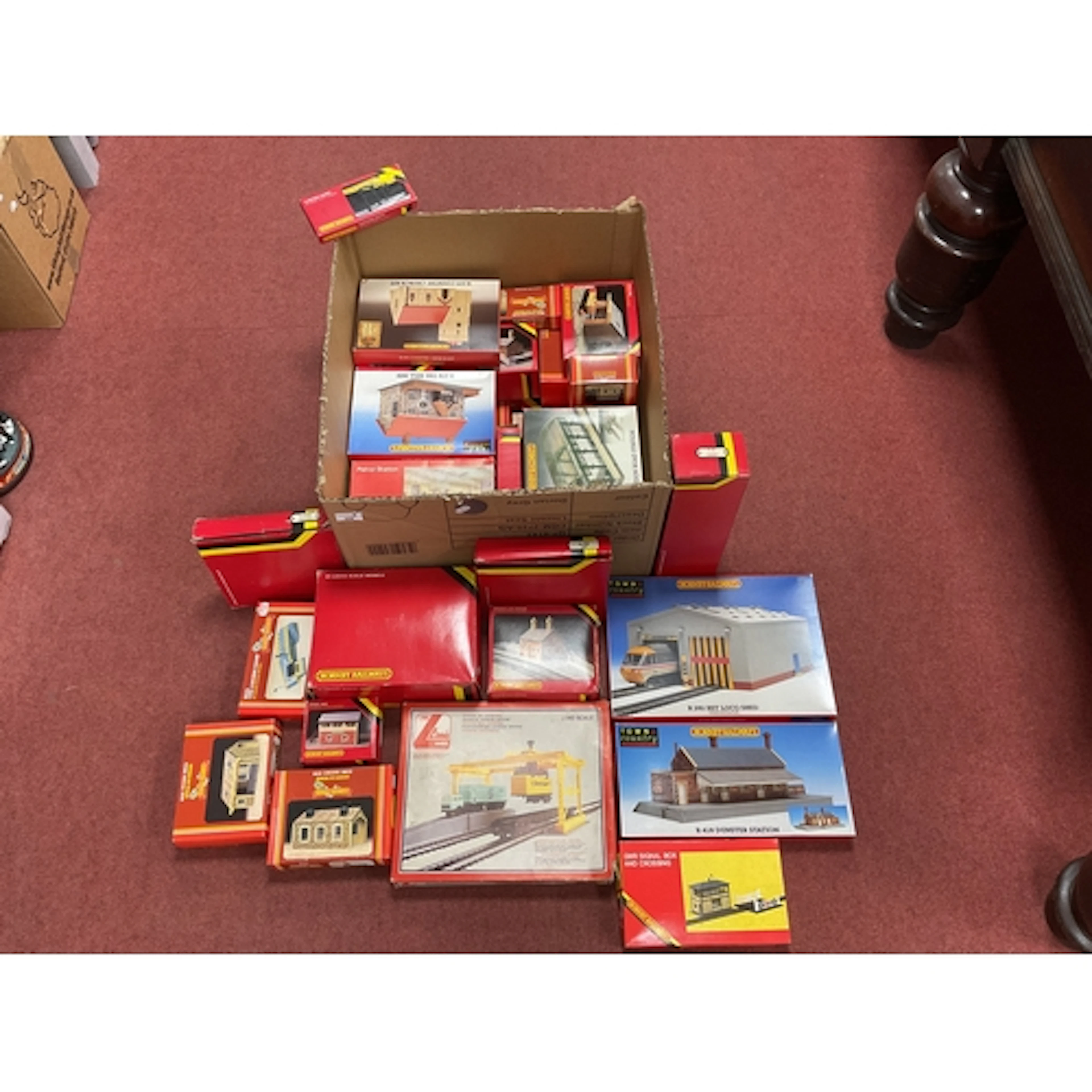 A large quantity of boxed Hornby 00 gauge buildings and buil...